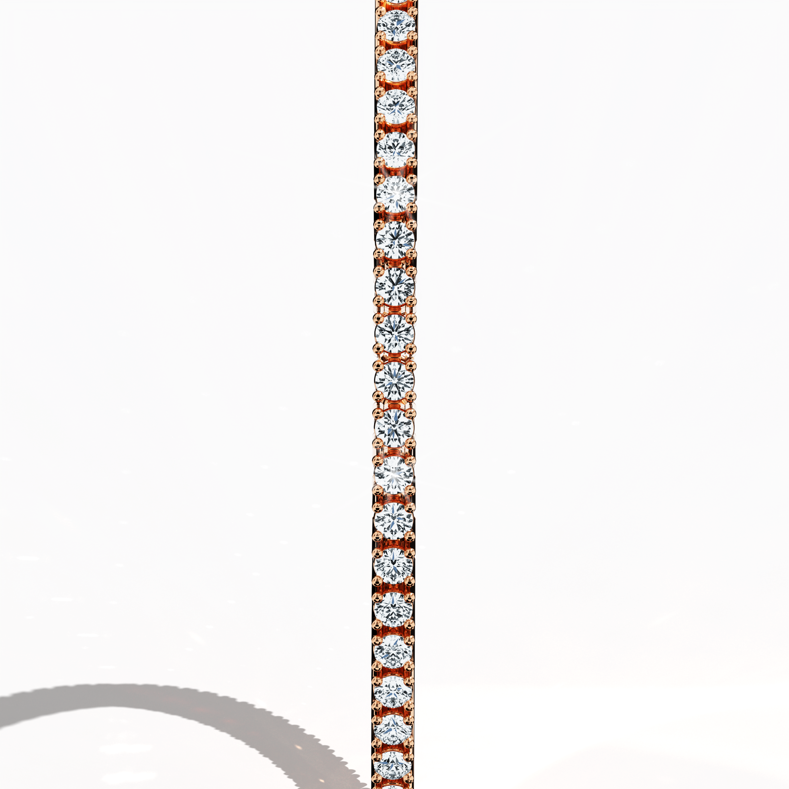 Captured in a refined standing side view, this 2-carat diamond tennis bracelet in lustrous rose gold (also recognized as rosy or pink-hued gold) displays a sleek, continuous band of sparkling diamonds. Known interchangeably as a diamond wristband, elegant cuff, or stylish arm candy, its contemporary design and expert craftsmanship radiate luxury. Flawless detailing and a radiant finish ensure this piece stands out in fine jewelry and designer accessories.