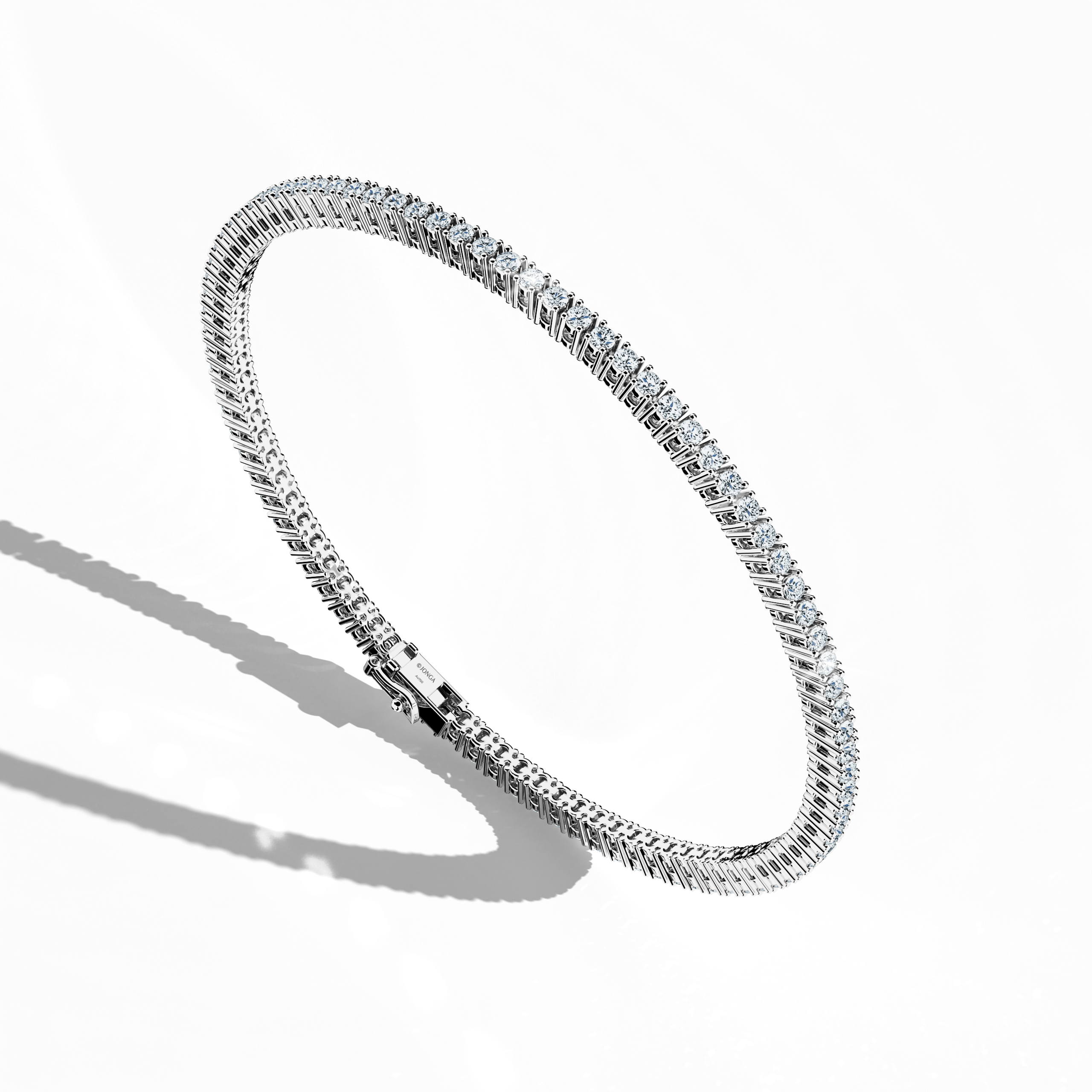 In a dynamic standing front top side view, this remarkable 2-carat diamond tennis bracelet in brilliant white gold—known as blanc or silver‑toned gold—displays a harmonious alignment of sparkling diamonds. Crafted with exceptional precision, this fine jewelry/jewellry design, often termed a diamond wristband, diamond cuff, or elegant arm candy, fuses contemporary style with enduring sophistication. International appeal and meticulous detailing make this luxury accessory truly distinctive.