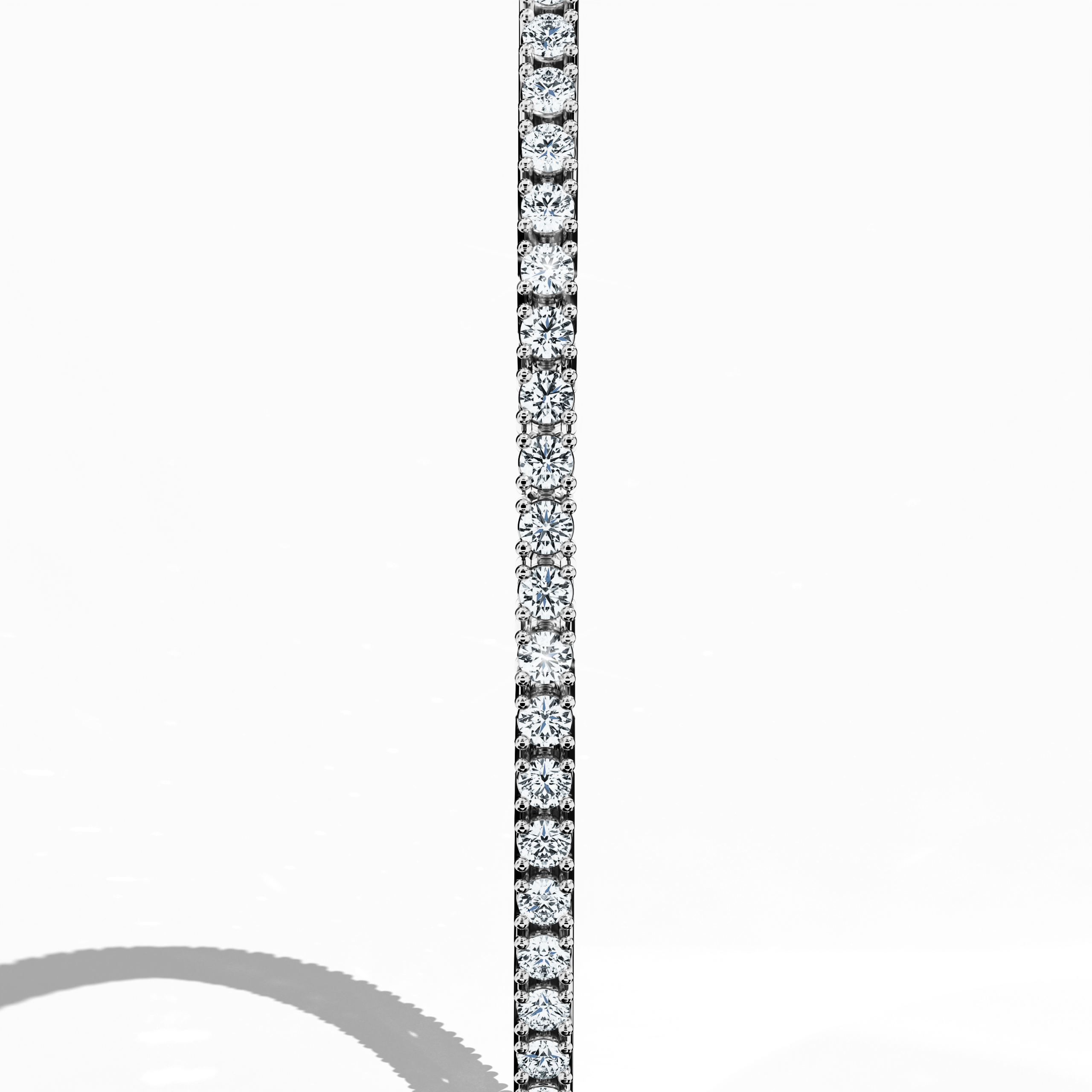 Displayed in a striking standing side view, this 2-carat diamond tennis bracelet in luminous white gold—alternatively known as blanc or silver‑toned gold—showcases a sleek, unbroken band of brilliant diamonds. Expertly crafted as a piece of fine jewelry/jewellry, its refined design is recognized as a diamond wristband, diamond cuff, or stylish arm candy. Marrying contemporary style with timeless charm, this luxurious accessory captures international appeal and impeccable artistry.