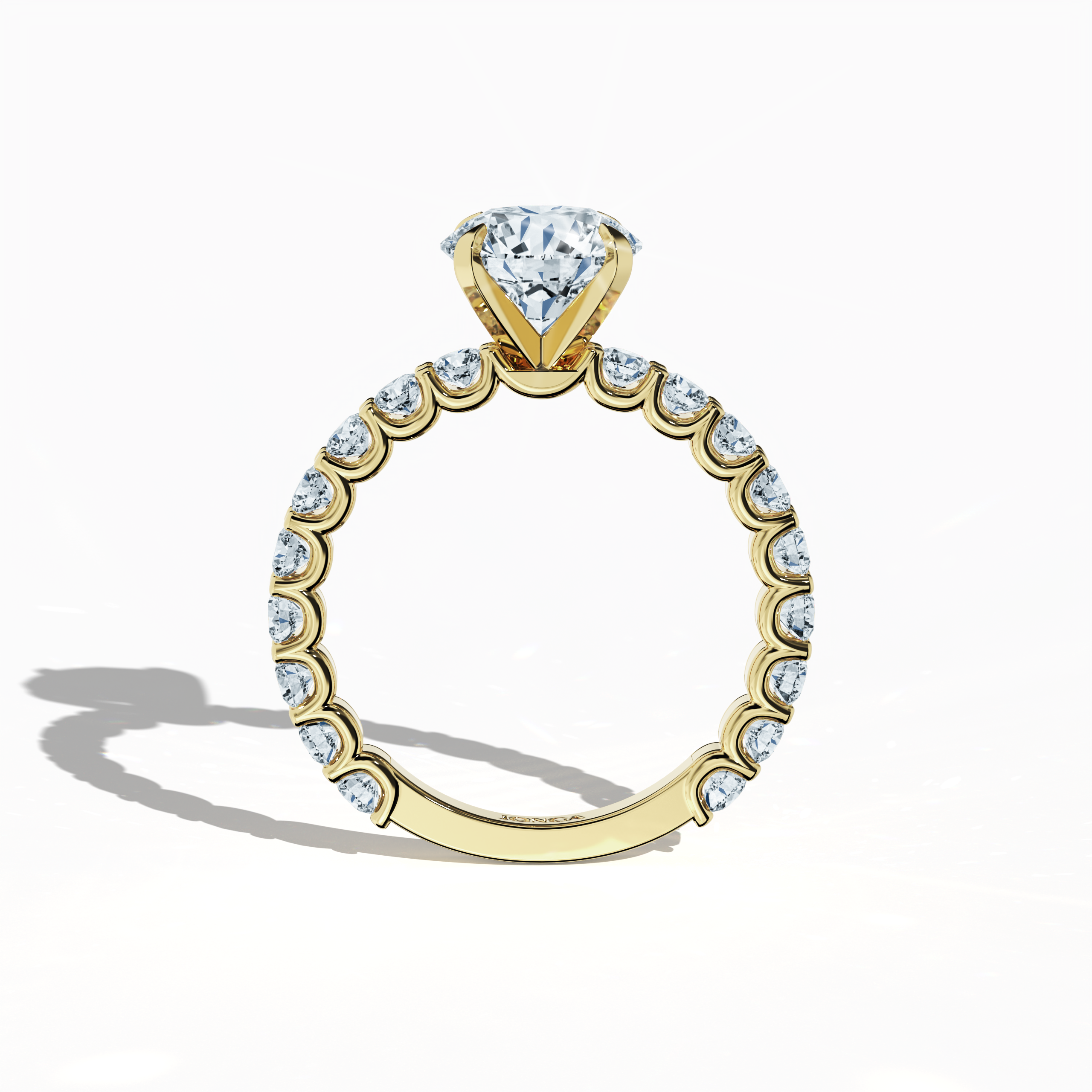 Standing front view of a yellow gold solitaire Eternity ring featuring a luminous 2 ct center/centre diamond and 1.30 ct side diamonds in a secure four-nail prong setting. This fine jewelry/fine jewellery piece is admired as an engagement ring, eternity band, or wedding band. A luxurious blend of heritage and modern design. Keywords: yellow gold, diamond eternity band, solitaire ring, wedding jewelry/jewellery, bridal, 3.30 ct, vintage classic.
