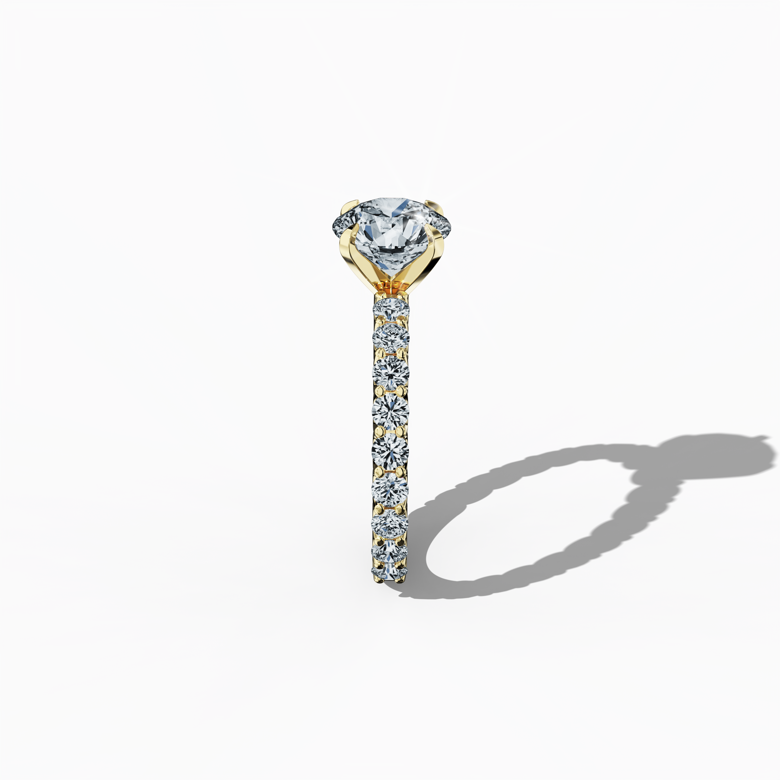 Side profile of a yellow gold solitaire Eternity ring, highlighting a captivating 2 ct center/centre diamond and 1.30 ct side diamonds in a four-nail prong setting. This profile emphasizes its structure, making it an excellent engagement, bridal, or anniversary jewelry/jewellery piece. Keywords: yellow gold, solitaire, diamond eternity band, luxury ring, wedding band, fine jewellery, 3.30 ct, timeless elegance.