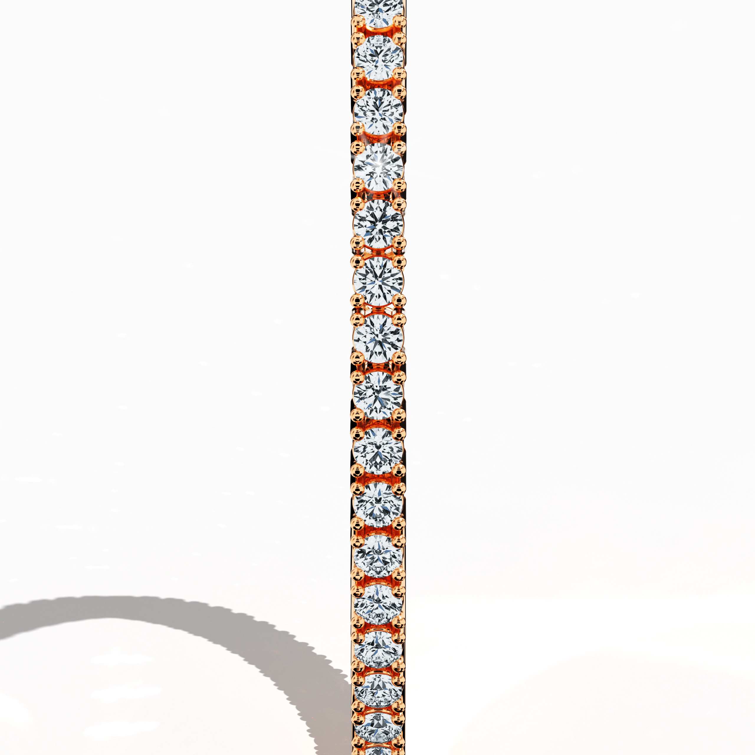 In a standing side view, this 4 carat diamond tennis bracelet in rose gold (alternatively called pink gold or red gold) reveals an elegant profile with a seamless row of prong-set round brilliant diamonds. Known as a tennis bracelet, line bracelet, eternity bracelet, river bracelet, or inline bracelet, its precise four‐prong design magnifies each stone’s luminous fire, making it perfect for upscale occasions and stylish everyday wear. Keywords: diamond tennis bracelet, 4 carat, rose gold, luxury jewelry.