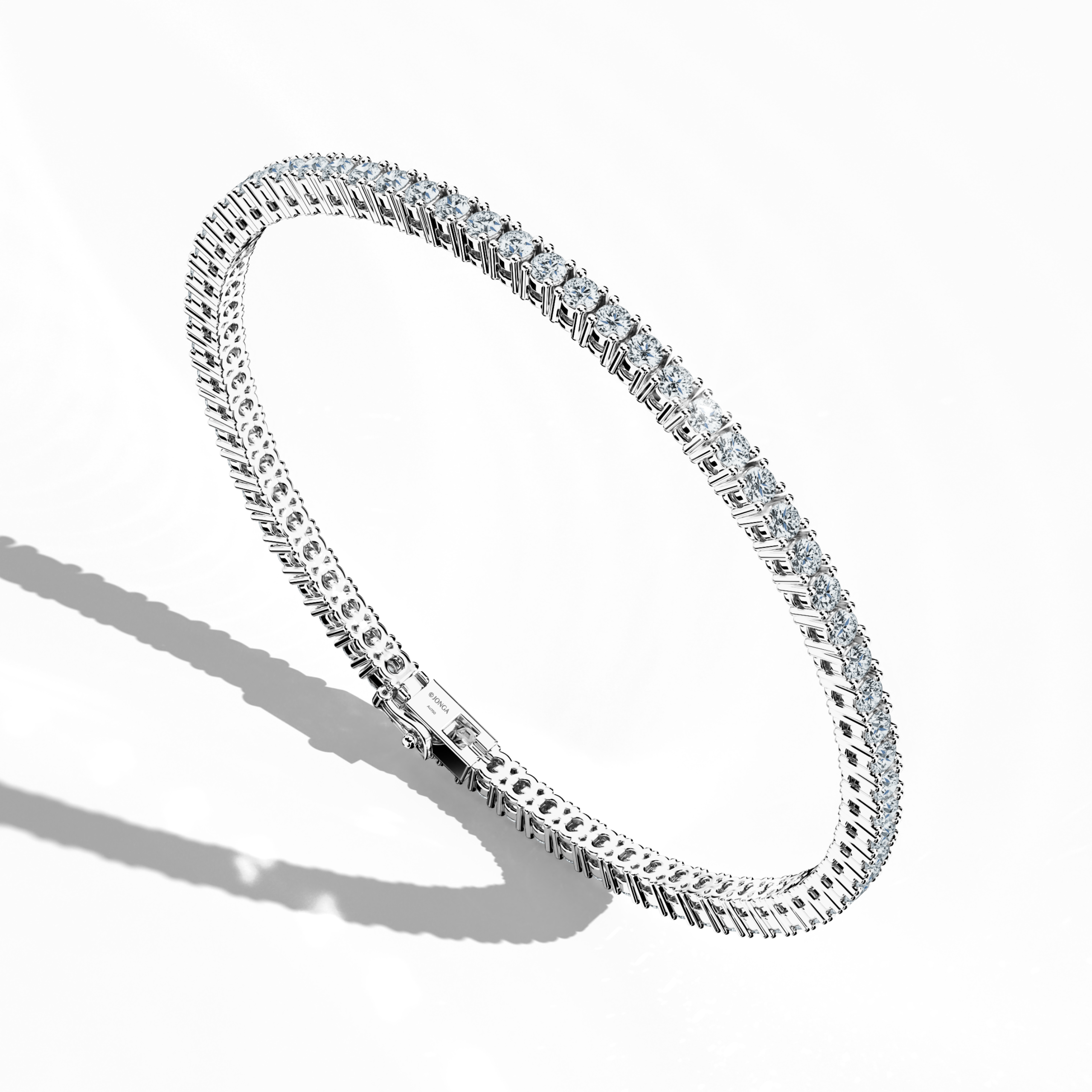 In a standing front top side view, this 4 carat diamond tennis bracelet in white gold (alternatively called grey gold or palladium gold) exhibits a gently curved band adorned with prong-set round brilliant diamonds. Also known as a tennis bracelet, line bracelet, eternity bracelet, river bracelet, or inline bracelet, its precise four‐prong design enhances the fire and brilliance of each gem. Perfect for accentuating both special occasions and upscale daily ensembles. Keywords: diamond tennis bracelet, 4 car