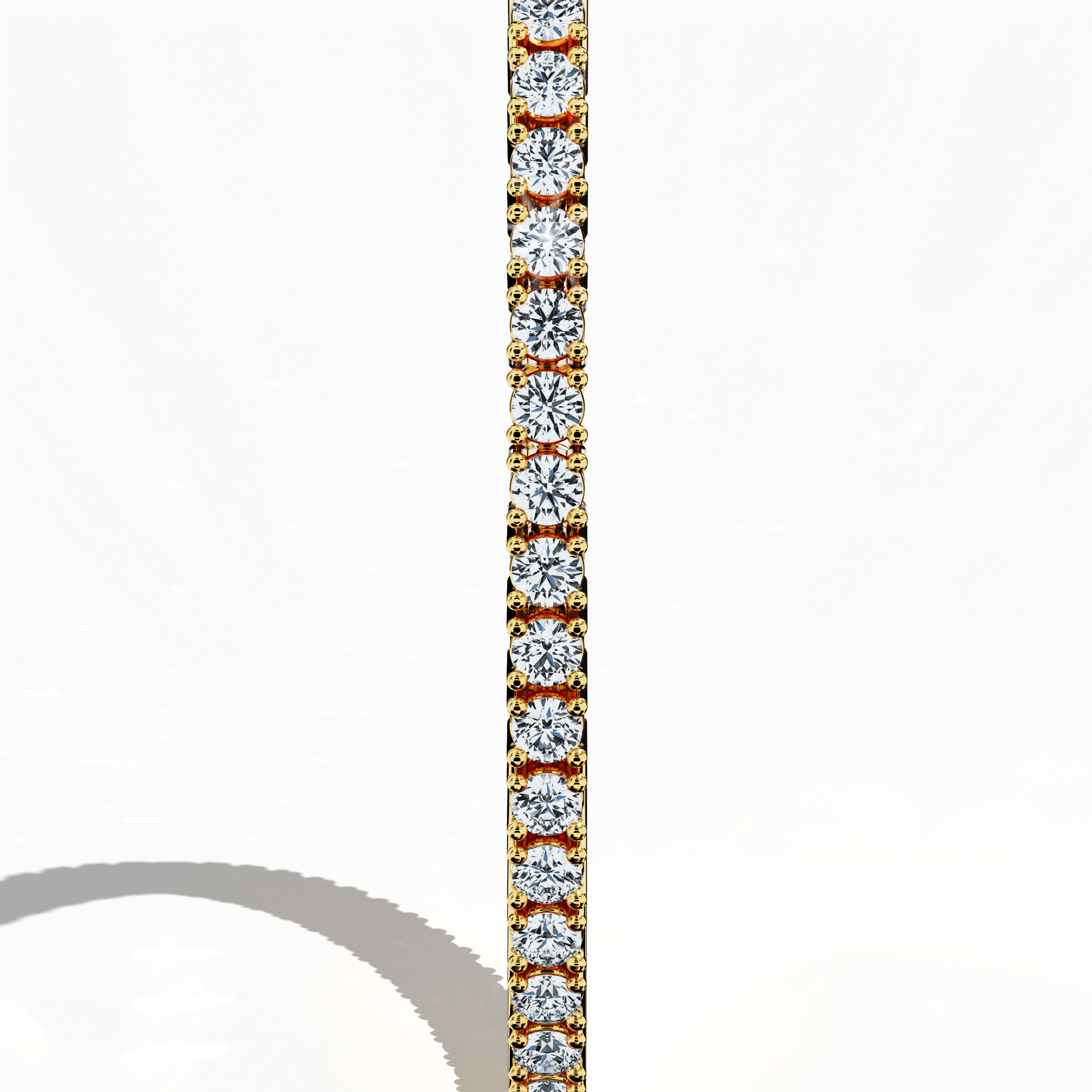 In a standing side view, this 4 carat diamond tennis bracelet in yellow gold (alternatively called classic gold or champagne gold) reveals a sleek profile formed by a seamless row of prong-set round brilliant diamonds. Known as a tennis bracelet, line bracelet, eternity bracelet, river bracelet, or inline bracelet, its elegant four‐prong design accentuates each diamond’s natural brilliance, perfect for upscale events and sophisticated everyday fashion. Keywords: diamond tennis bracelet, 4 carat, yellow gold