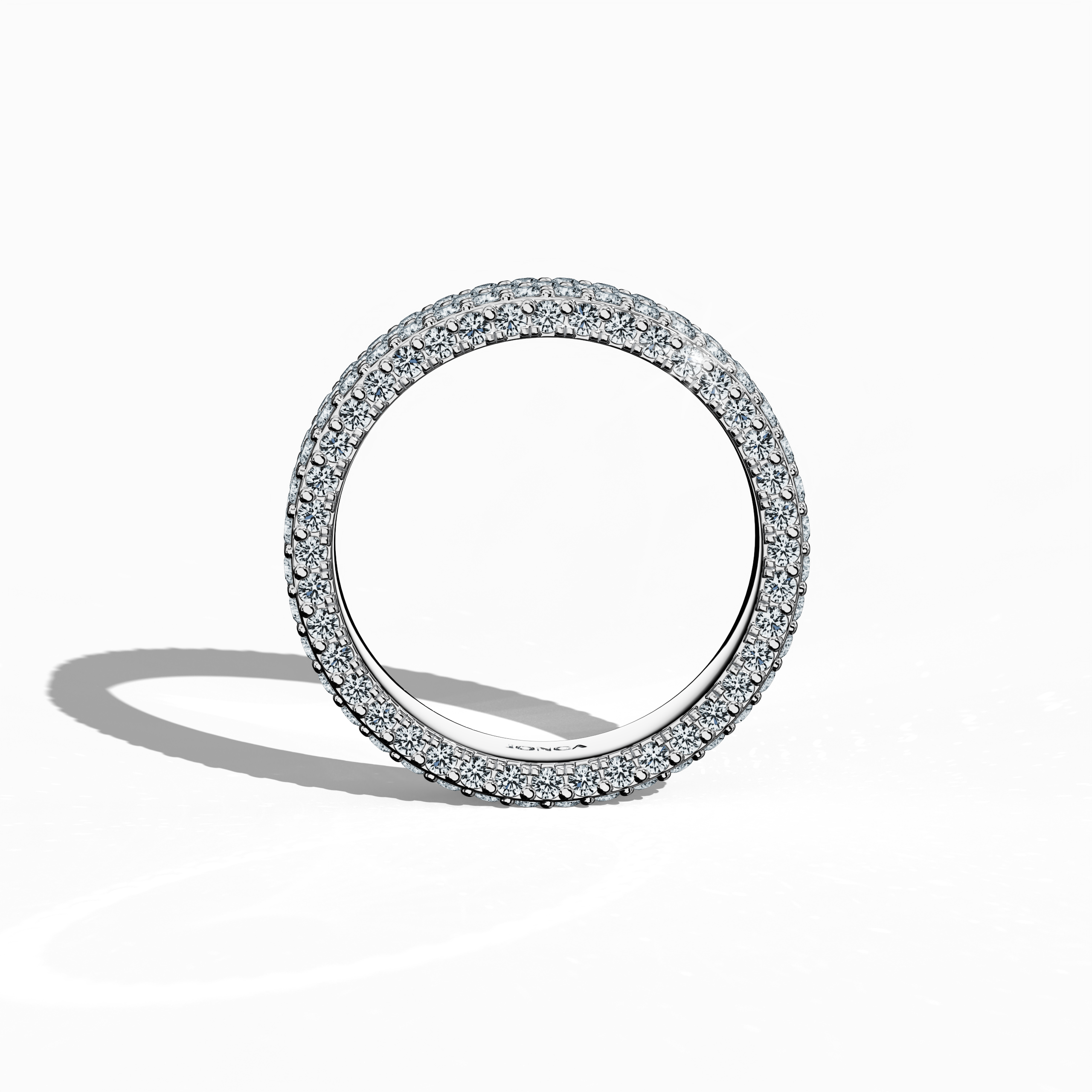 Revel in the captivating charm of our white gold 5‑row diamond band showcased in a standing front view. With up to 2.55 carats of micro diamonds precisely set, the design exudes a refined, timeless sophistication. Inspired by esteemed 4‑row styles such as Classic, Vintage, Contemporary, Modern, Minimalist, Ornate, and Channel‑Set, its brilliant icy finish and sterling glow deliver a luxurious, globally inspired statement. Keywords: white gold, micro diamond, refined, luxury, elegance.