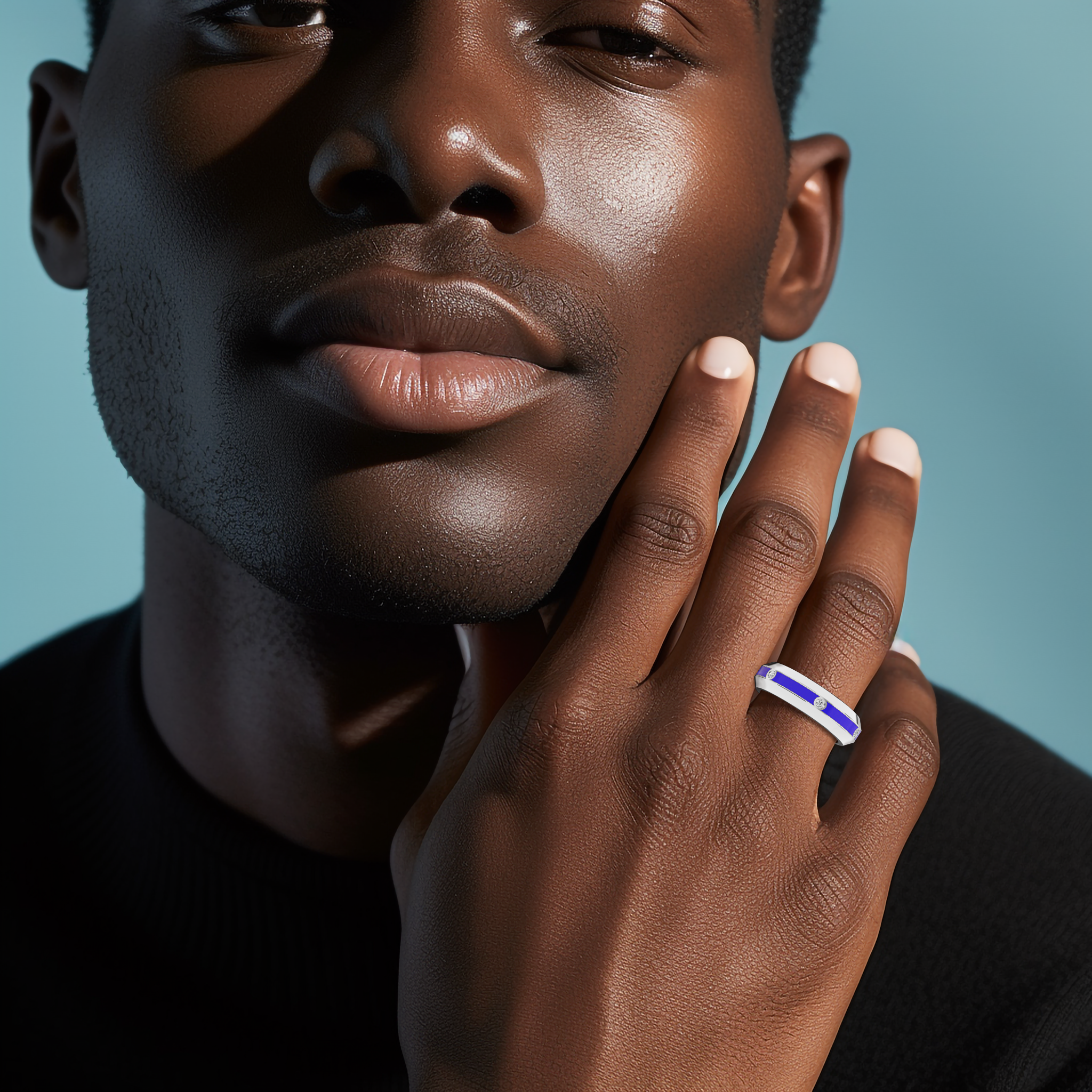 Worn on a model’s finger, this six diamond center step enamel ring in white gold with vivid blue glossy enamel exudes sophistication and charm. The 0.20-carat diamond row, paired with the dynamic ‘Sterling Radiance’ and ‘Icy Blue Brilliance’ design elements, reflects a fusion of modern innovation and timeless luxury. The image highlights premium craftsmanship and a distinctive, international appeal. Keywords: white gold, blue enamel, diamond ring, luxury, designer, elegant, modern.
