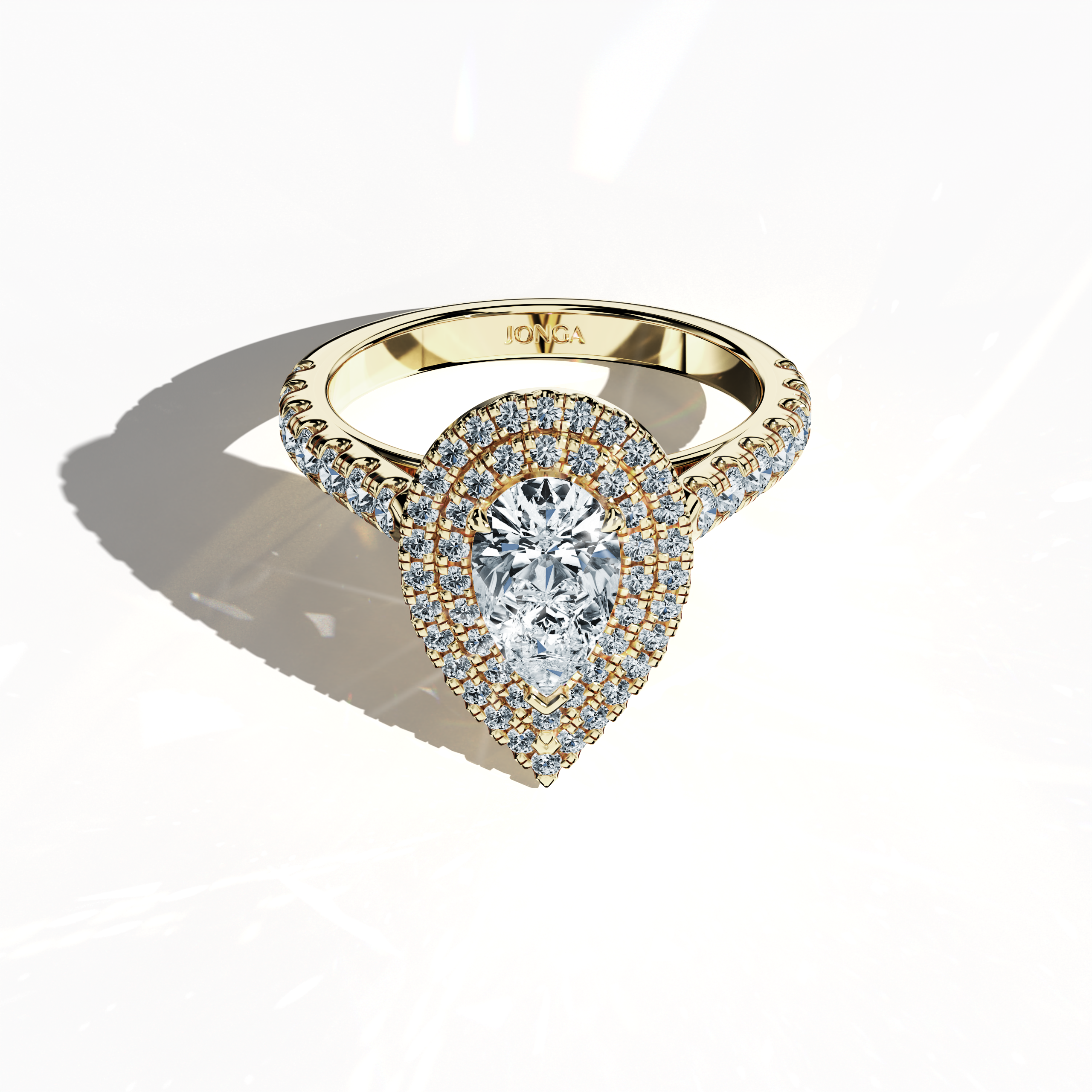 Photograph showcasing an exquisite double halo diamond ring in luminous yellow gold (classic gold/sunlit gold) from a sleeping front top view. It highlights a striking 1ct pear‐cut center diamond (teardrop, waterdrop) surrounded by up to 1ct of sparkling side diamonds in a pave setting. Incorporating design styles such as double halo, pavé halo, twin halo, cathedral halo, vintage halo, and contemporary halo, the image radiates luxurious artistry, precise detailing, and global sophistication.