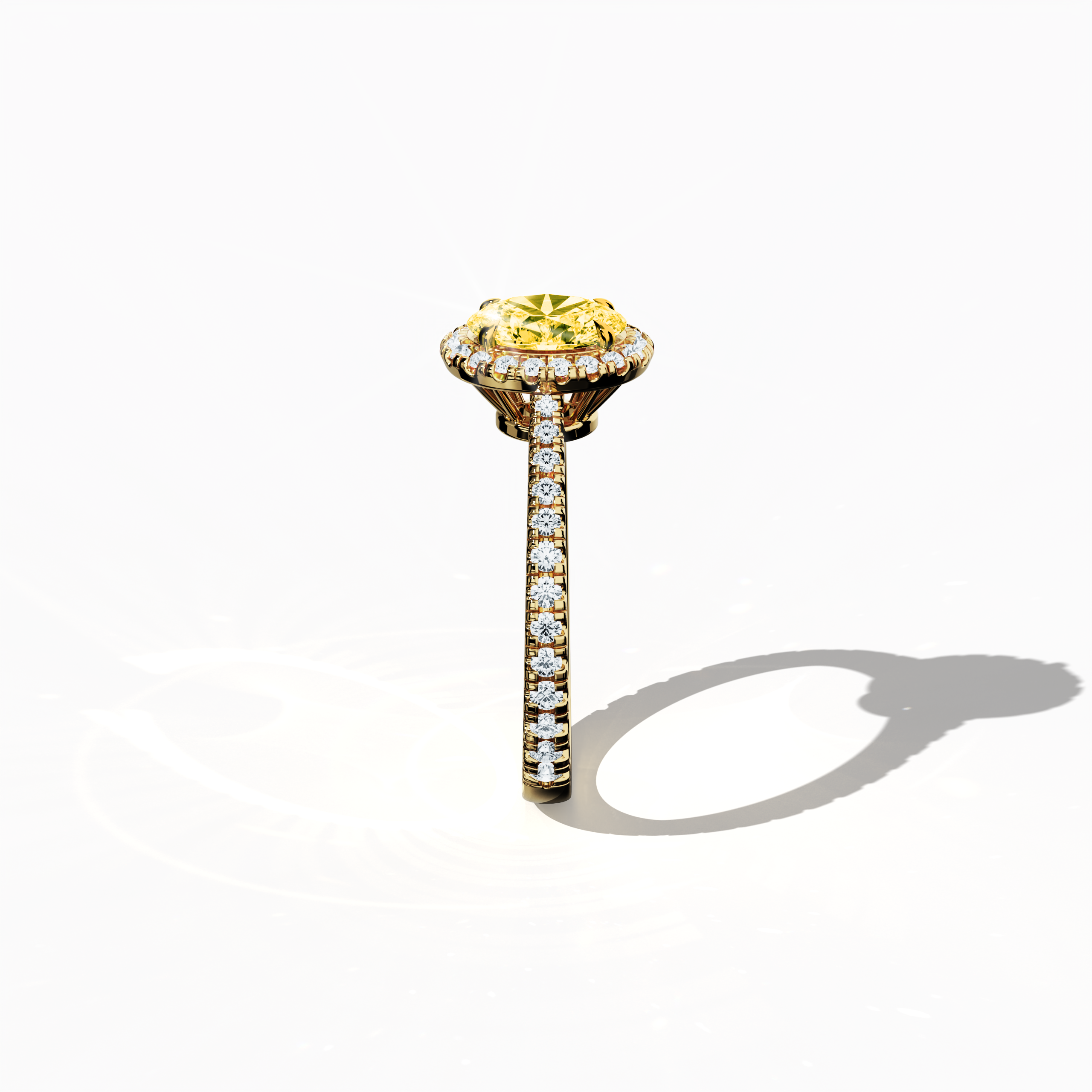 Revealed in a detailed standing side view, this halo paved ring in sumptuous yellow gold features a striking 1 carat yellow oval‐cut diamond center, set within a 0.60 carat halo of luminous side stones for a total of 1.60 carats of brilliance. Integrating Classic Halo, Modern Halo, Vintage Halo, Contemporary Halo, and Eternity Halo design influences with oval and brilliant cut accents, its golden, amber‐toned finish radiates vibrant luxury and refined charm. Keywords: handcrafted, sparkle, elegance.