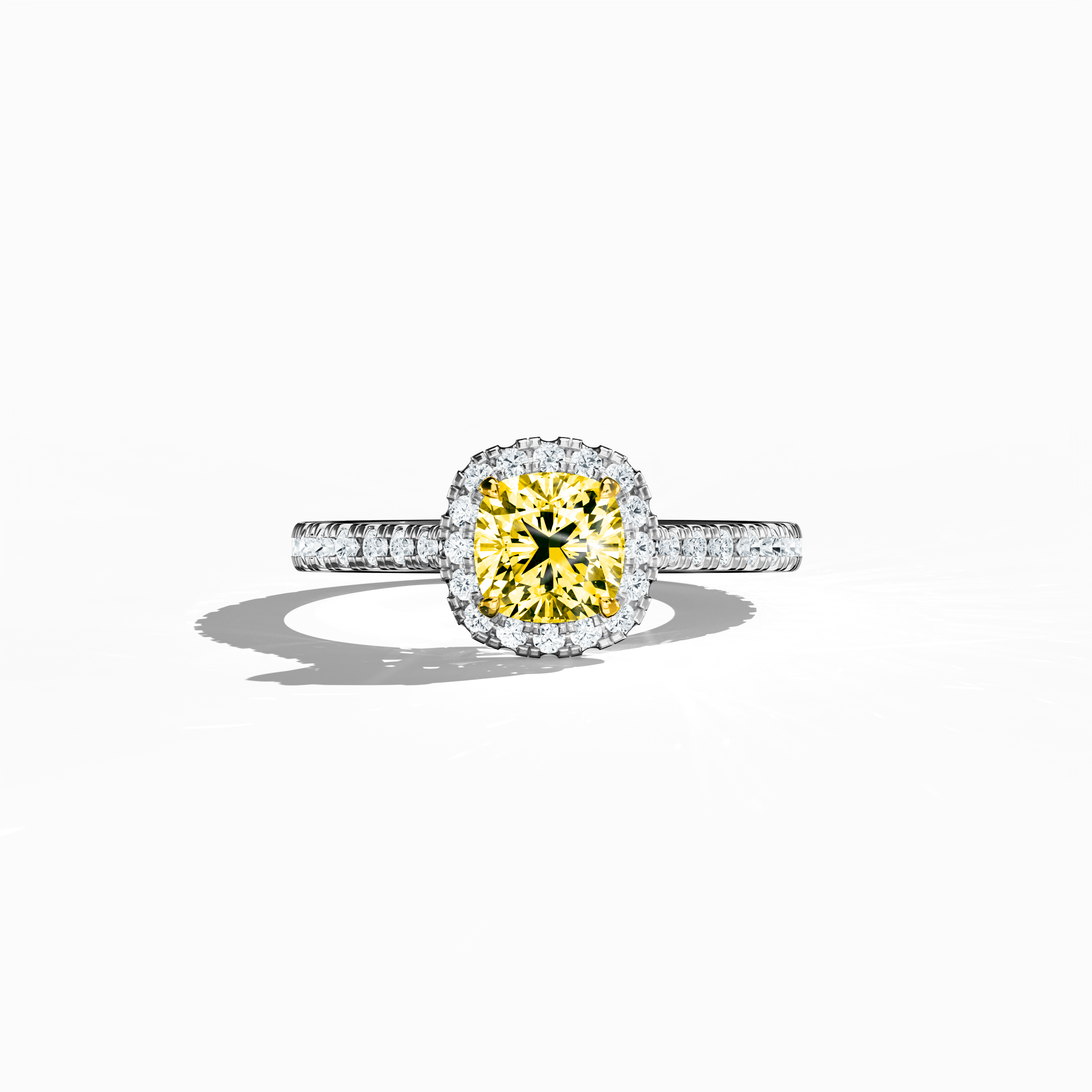 Captured in a serene sleeping front view, this halo paved ring in brilliant white gold displays a radiant 1ct yellow cushion‐cut diamond centerpiece, elegantly framed by a 0.60ct halo of dazzling side stones for a total of 1.60 carats. The design blends Classic Halo, Modern Halo, Vintage Halo, Contemporary Halo, and Eternity Halo styles with influences from cushion and radiant cuts, along with alternate white gold descriptors like icy and platinum-like. Keywords: luxury, handcrafted, sparkle, elegance.