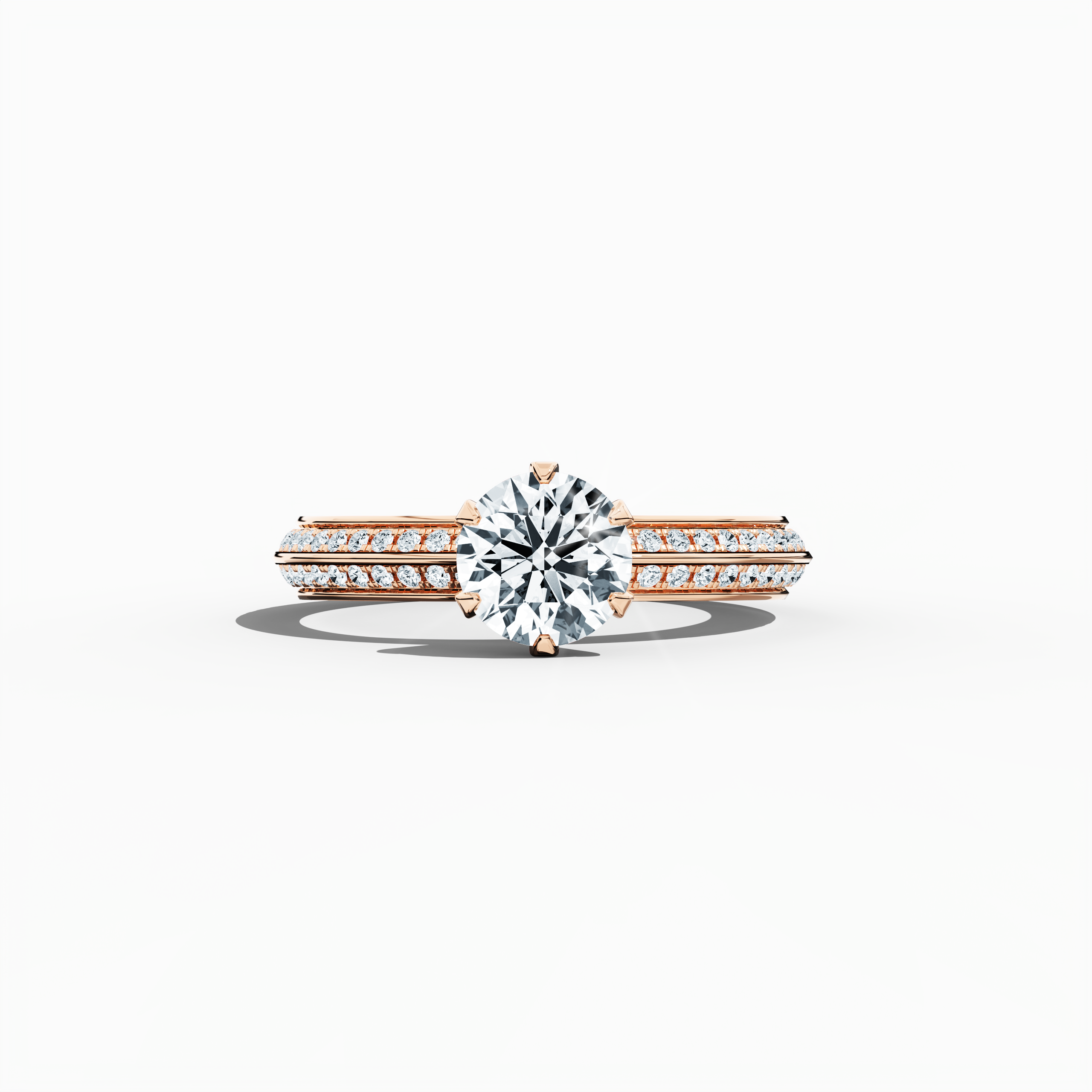 Solitaire paved ring with 1.40 ct total diamonds – featuring a 1 ct center diamond and 0.40 ct pavé side stones – set in a soft rose gold band (blush/pink gold) with a modern two‑step design and a sharp central line. Shown in a sleeping front view on a flat surface, this fine jewelry/fine jewellery ring exudes romantic warmth and contemporary elegance.