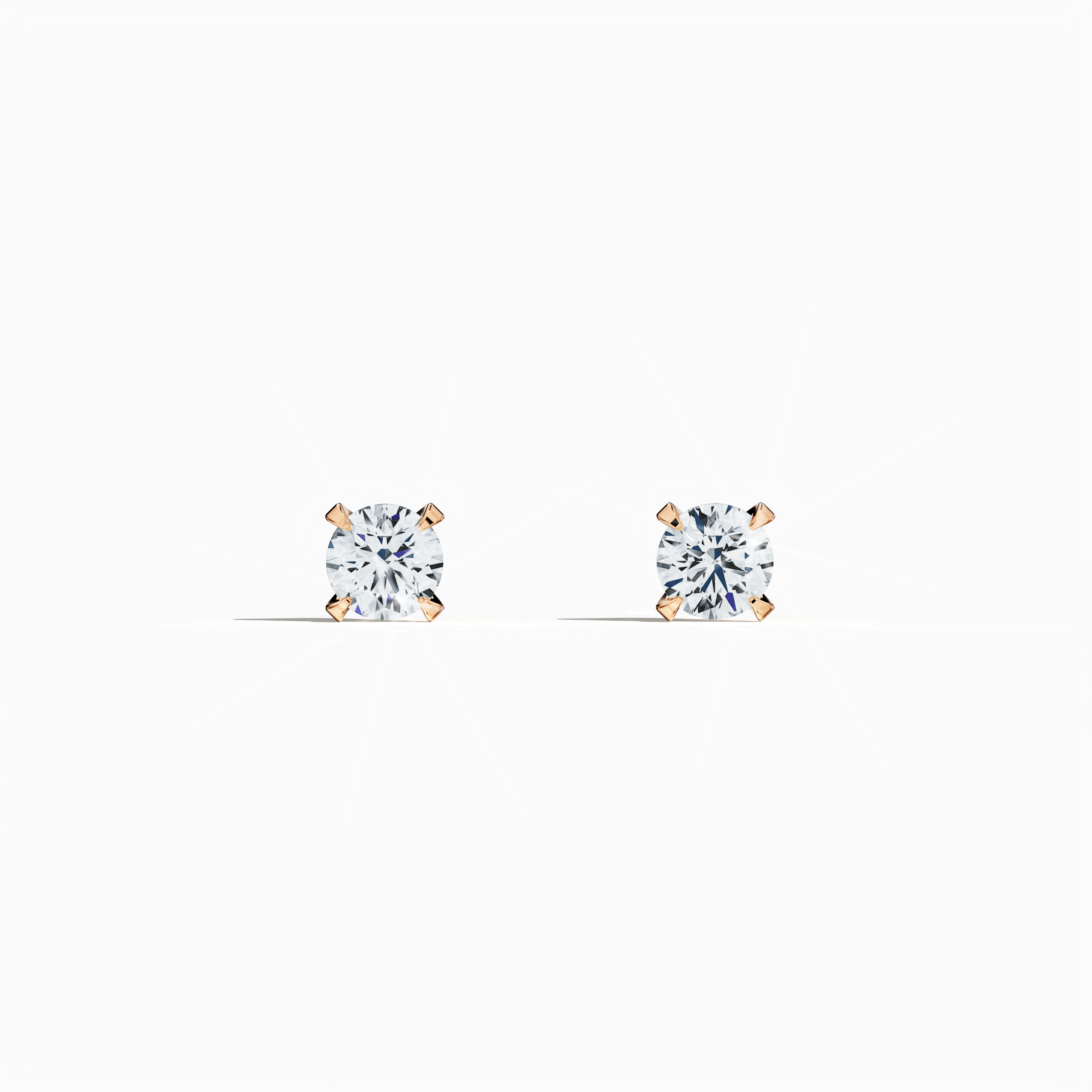 Front view of 0.60 carat natural diamond earring in 18k rose gold with nail prong setting; diamond stud, 0.60ct solitaire diamond, luxury fine jewelry/fine jewellery ear accessory.