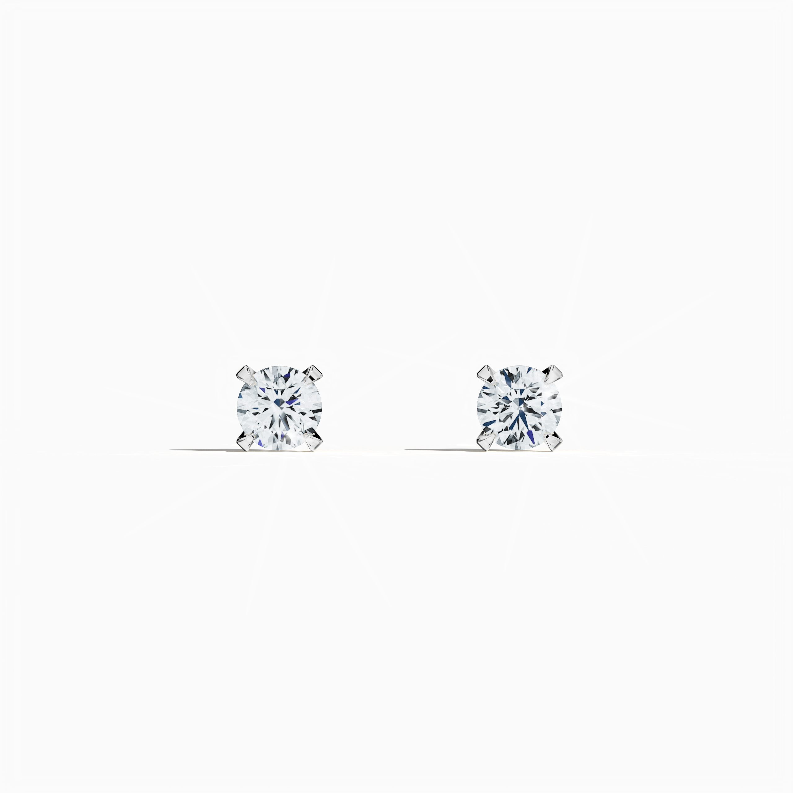 Front view of 0.60 carat natural diamond earring in 18k white gold with nail prong setting; diamond stud, 0.60ct solitaire diamond, luxury fine jewelry/fine jewellery ear accessory.