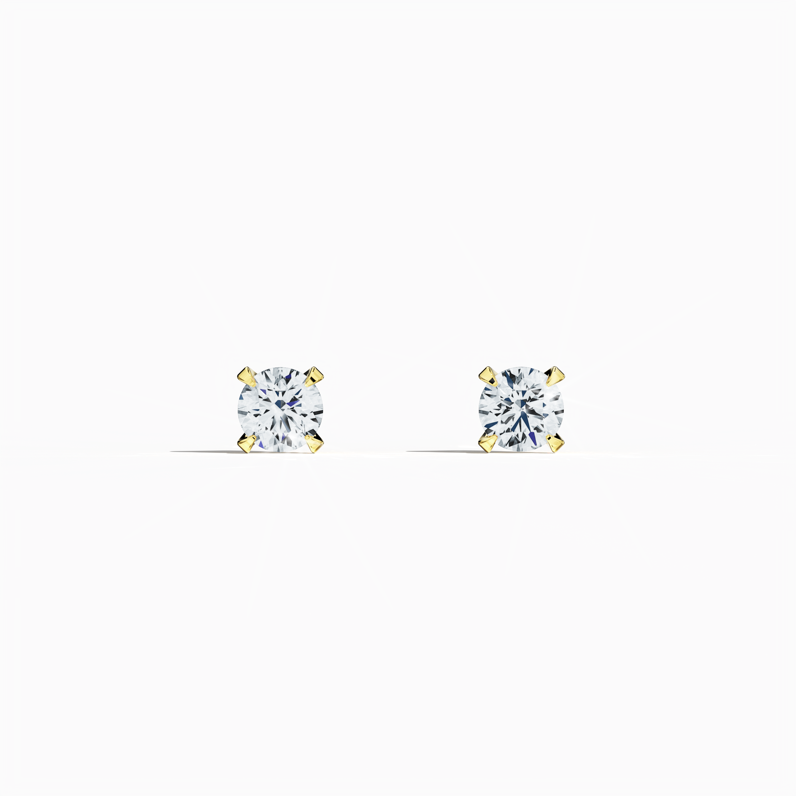 Front view of 0.60 carat natural diamond earring in 18k yellow gold with nail prong setting; diamond stud, 0.60ct solitaire diamond, luxury fine jewelry/fine jewellery ear accessory.