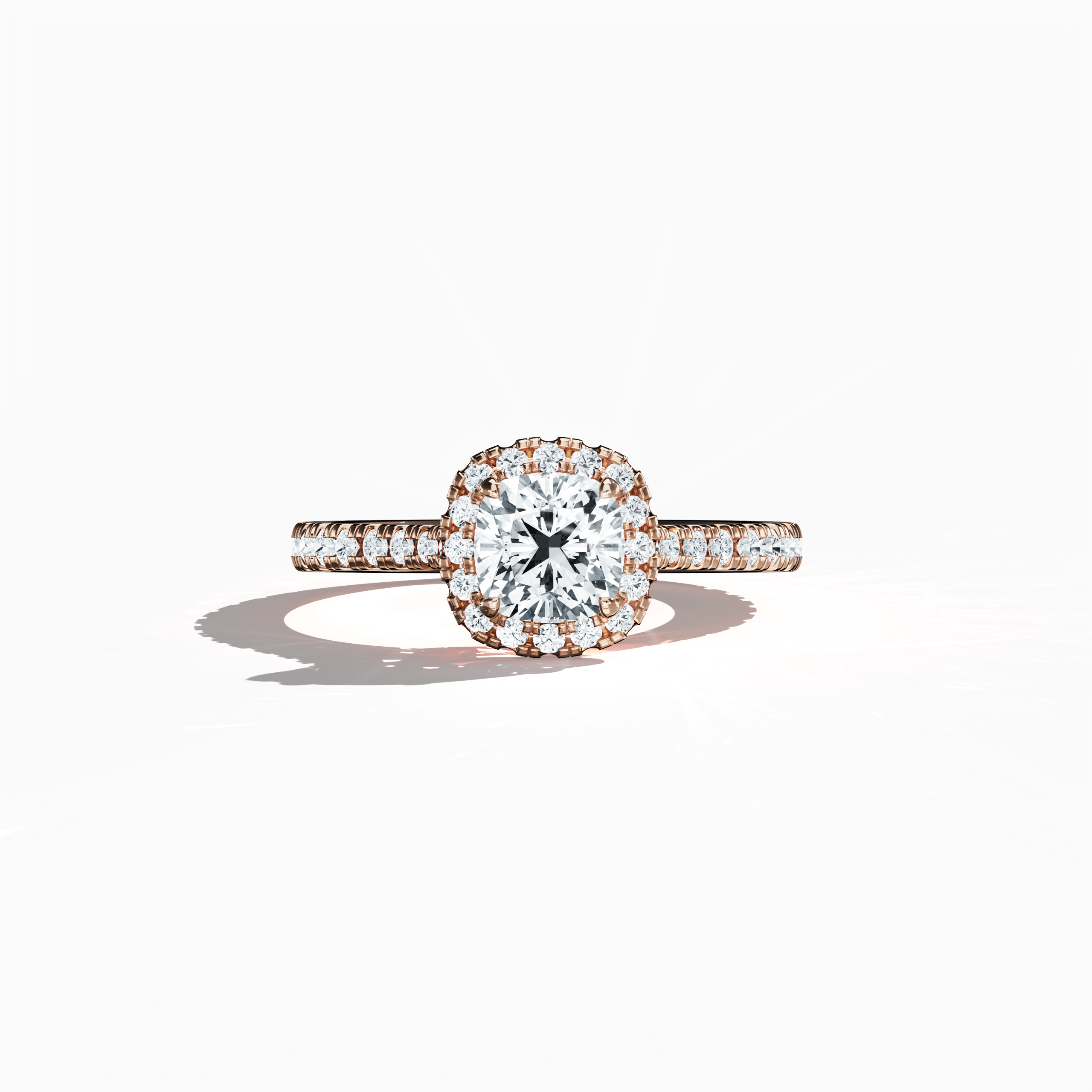 Exquisitely depicted in a soft sleeping front view, this halo paved diamond ring in radiant rose gold emanates a warm blush glow. With a total weight of 1.60 carats, its 1 ct cushion diamond center is gracefully encircled by a 0.60 ct halo of brilliant side stones. The design blends Classic Halo, Vintage Halo, and Contemporary Halo motifs with cushion and radiant influences, enhanced by a pink, blush finish. Keywords: luxury, handcrafted, sparkle, elegant, diamond.