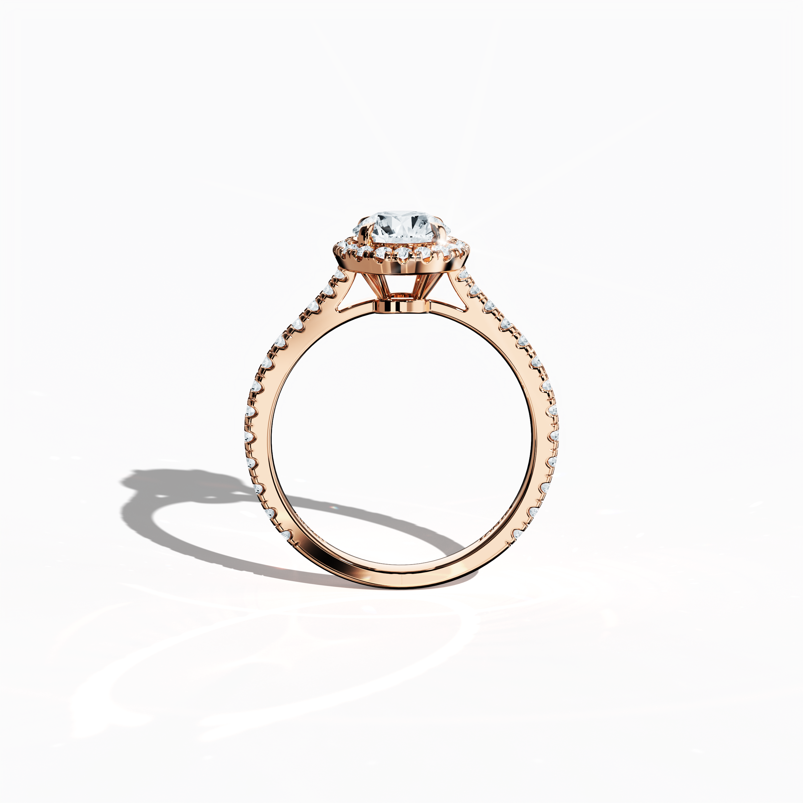 Vivid standing front view of a rose gold halo paved ring emphasizing a brilliant 1ct round‐cut center diamond and its encircling 0.60ct side diamond halo. The band, showcased in warm rose, pink, and blush gold hues, exhibits meticulous pavé craftsmanship with design influences spanning classic halo, vintage halo, modern halo, and bridal halo motifs. Keywords: exquisite, round radiance, luxury, timeless design, refined artistry.