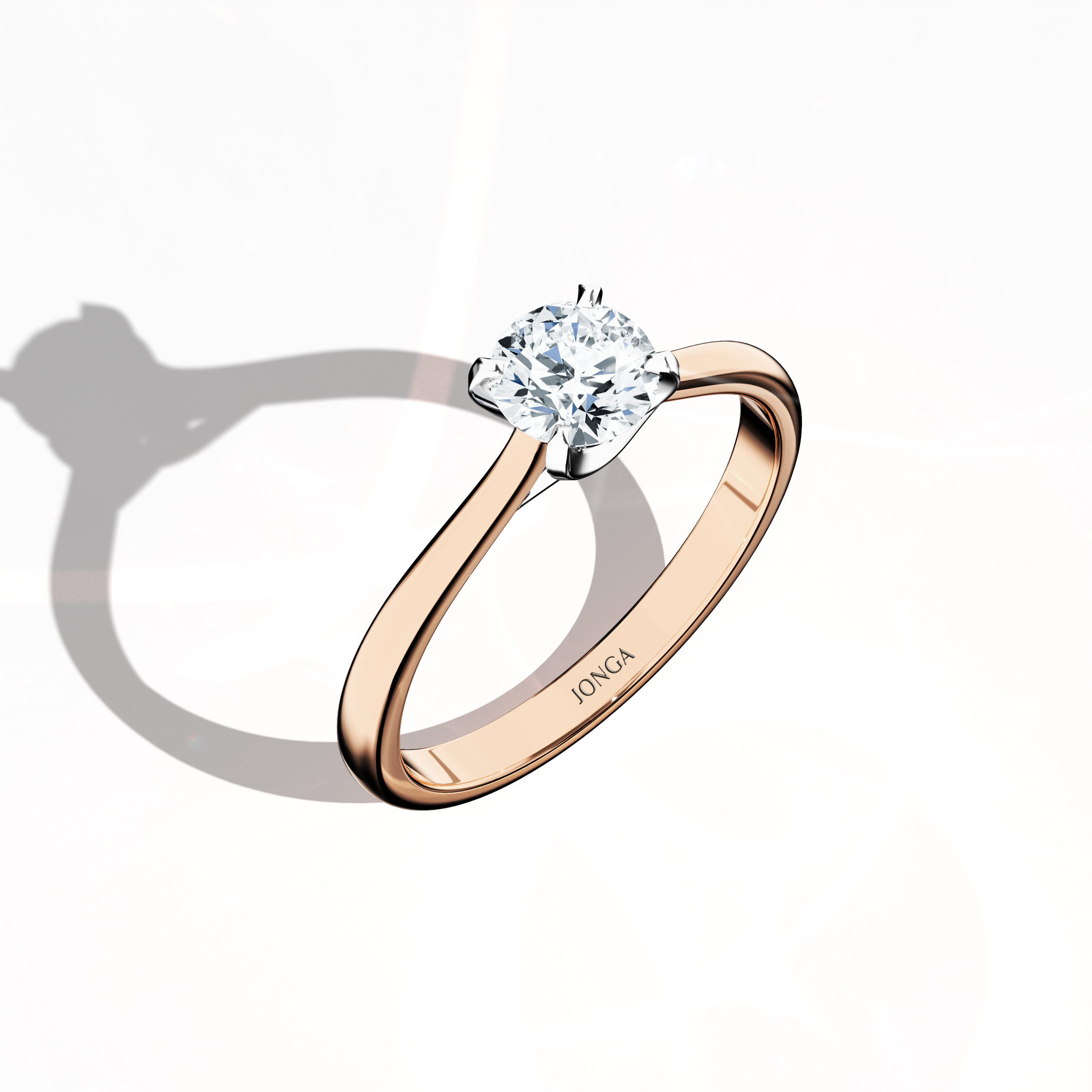 Modern solitaire diamond ring with a 0.70 ct center diamond in a unique twisted bottom design and four‑tap white gold prongs, set in a soft rose gold band (blush/pink gold). Captured from a standing front top side angle, this fine jewelry/fine jewellery ring emphasizes its brilliant sparkle and delicate, romantic finish.