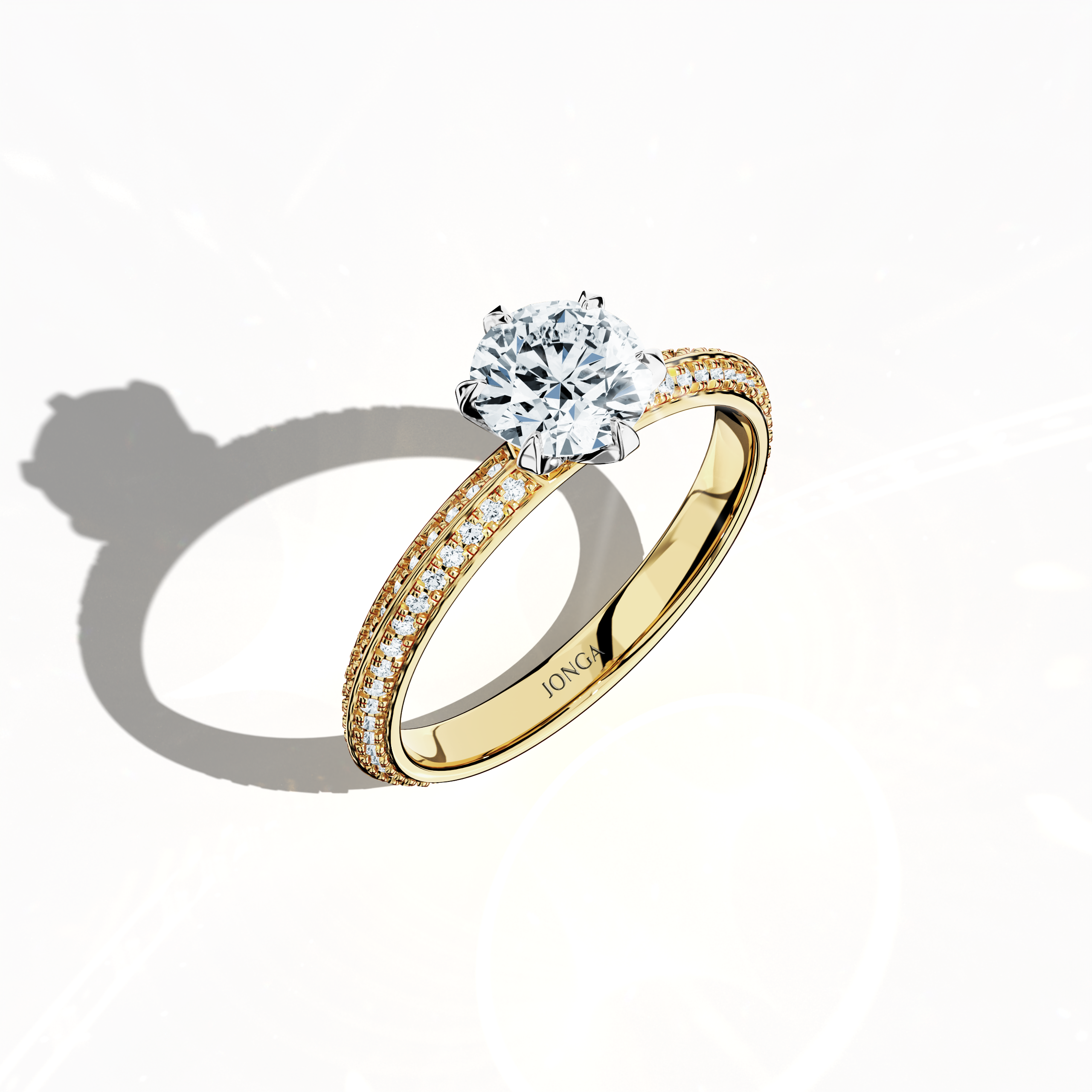 Modern 1.40 ct diamond ring featuring a 1 ct center diamond and 0.40 ct pavé side stones, set in classic yellow gold with a dual‑tier, step-designed band and defined central line. Captured from a front top side angle, this fine jewelry/fine jewellery ring emphasizes its refined pavé setting and vibrant, warm allure.