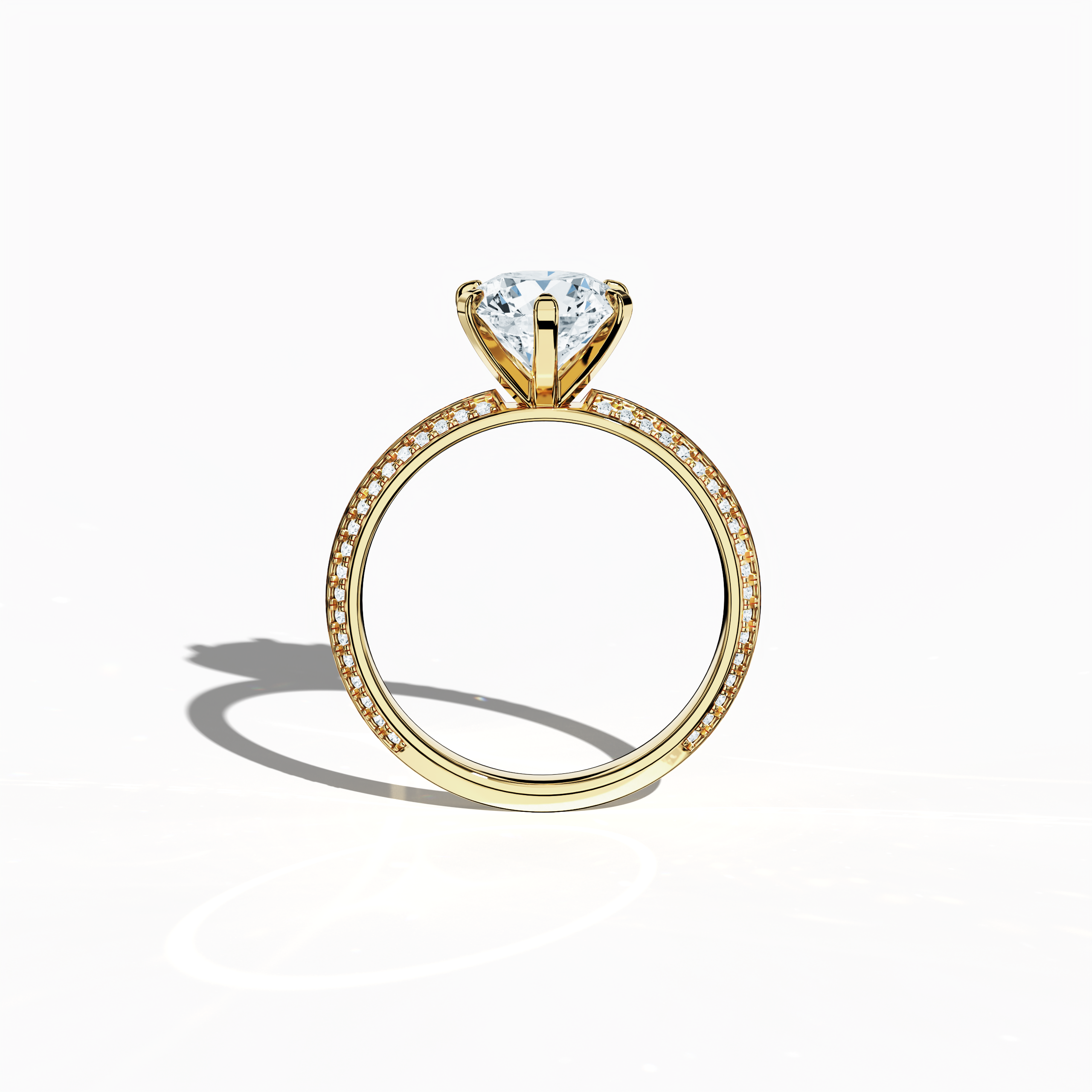 Classic solitaire diamond ring with 2.40 ct total carats—2 ct center and 0.40 ct pavé side stones—set in a rich yellow gold band featuring a distinctive two‑step band design with a crisp central line. Displayed in a front view, this fine jewelry/fine jewellery ring exudes timeless luxury and warm sophistication.