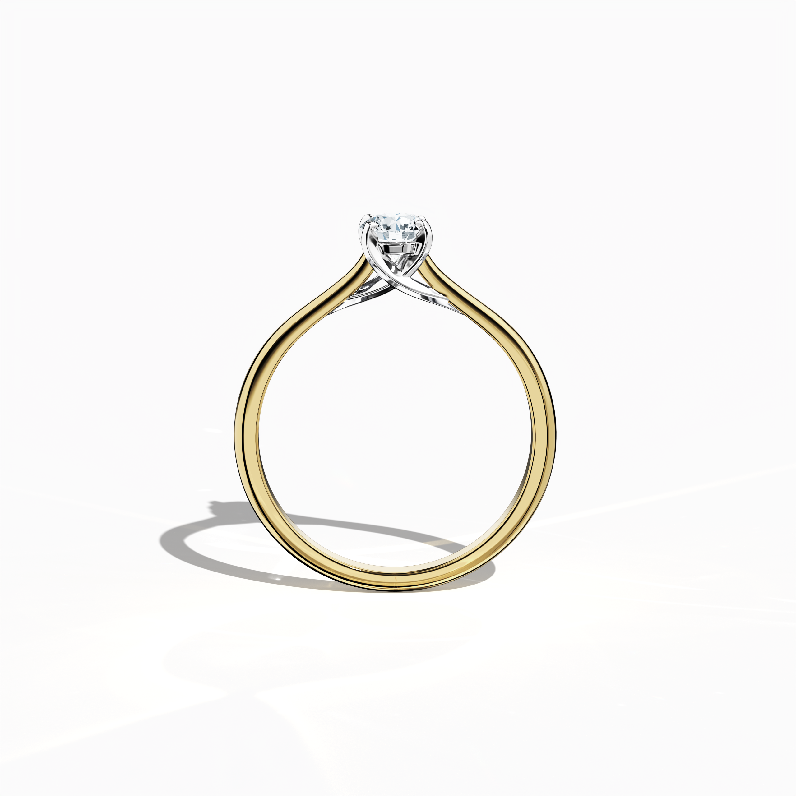 Refined solitaire diamond ring with a 0.30 ct center stone in a unique twisted bottom setting, supported by four‑tap white gold prongs and paired with a rich yellow gold band (classic/warm yellow gold). Shown from a standing front view, this fine jewelry/fine jewellery ring exhibits a robust, radiant design and timeless appeal.