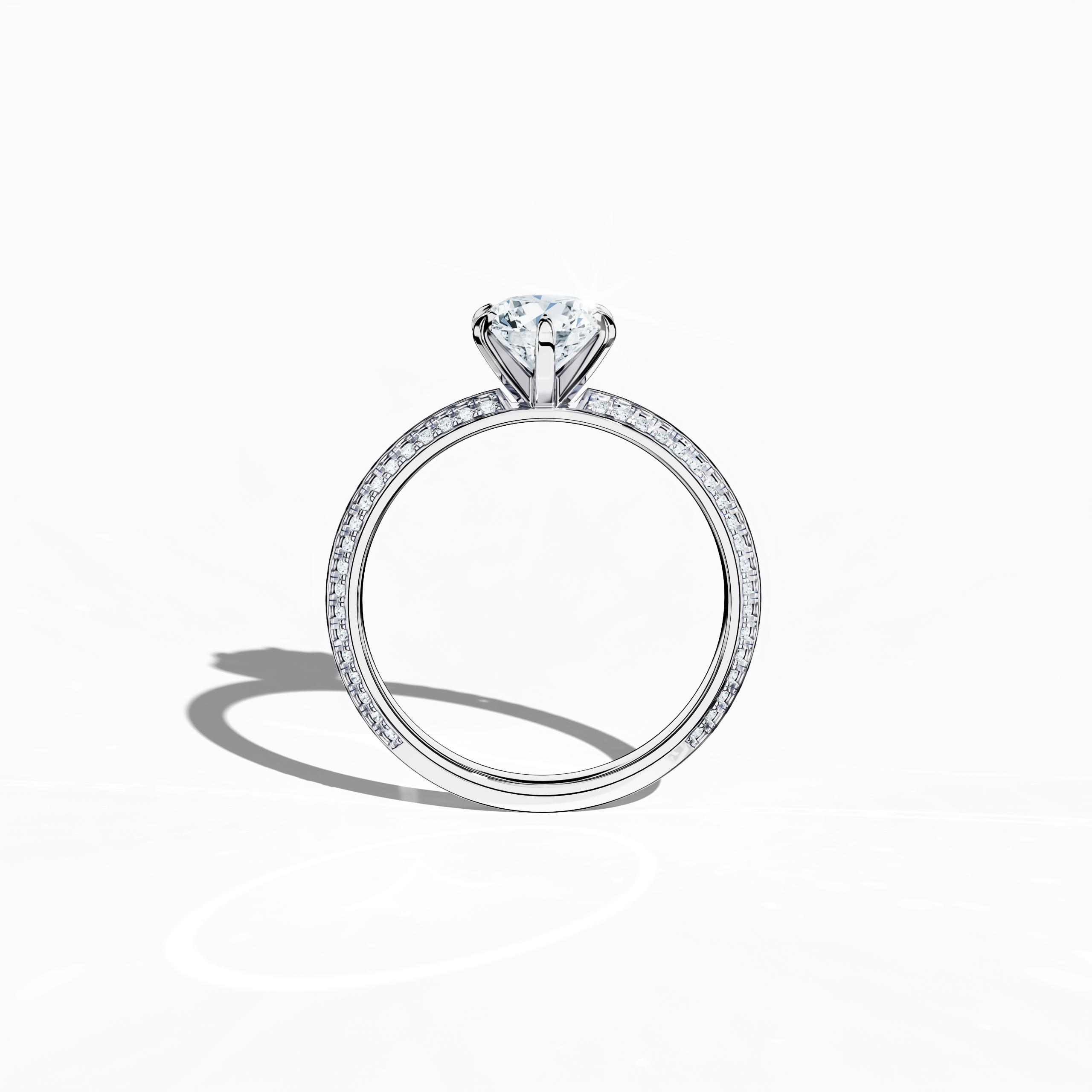 "Classic solitaire diamond ring with 1.40 ct total carats – a 1 ct center stone and 0.40 ct pavé side stones – set in bright white gold with a distinctive two‑step band and a sharp central accent. Shown in a front view, this fine jewelry/fine jewellery piece radiates timeless modernity.