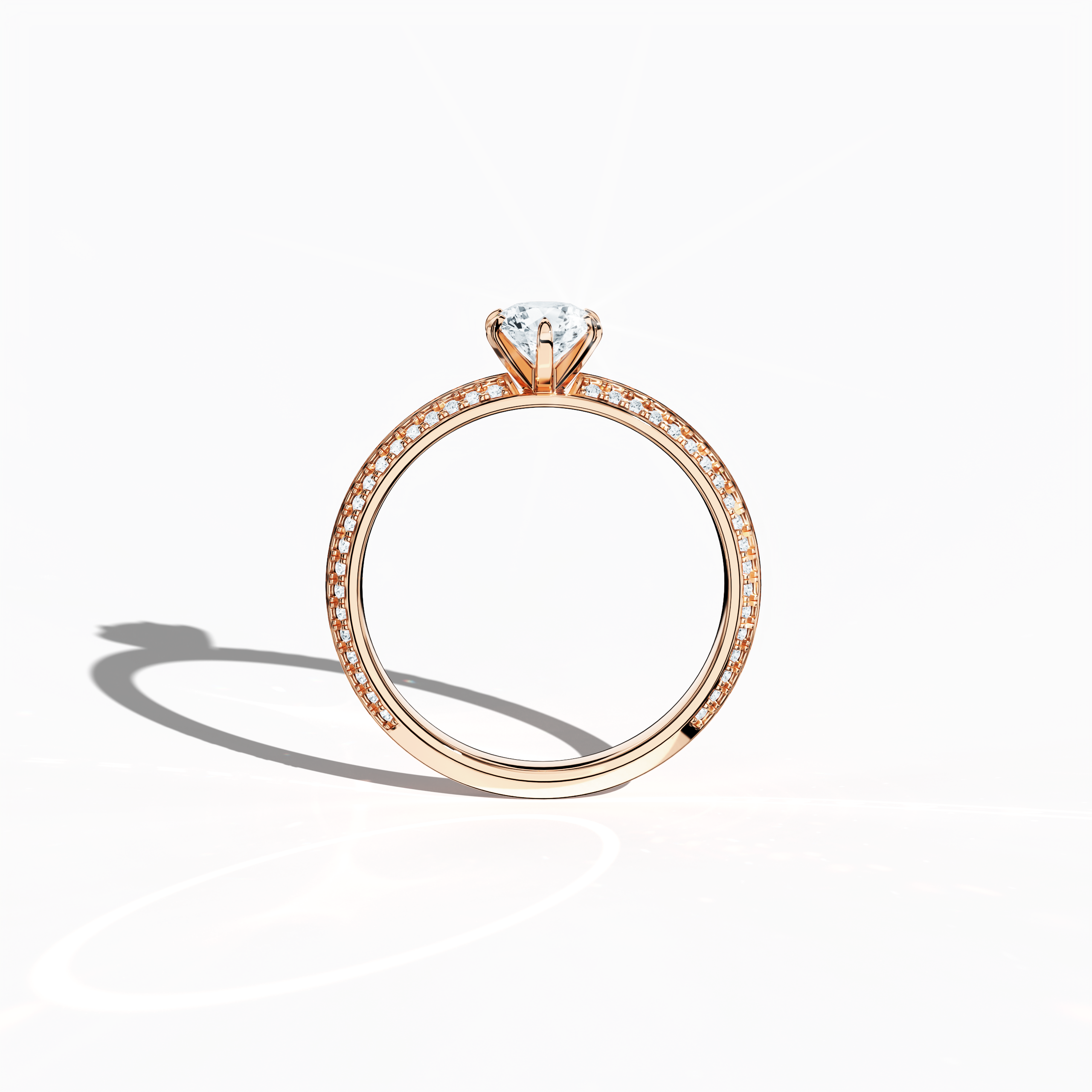 Classic solitaire diamond ring with 0.90 ct total carats – 0.50 ct center diamond and 0.40 ct pavé side stones – set in soft rose gold (blush/pink gold) with a distinctive two‑step band featuring a crisp central line. Displayed in a front view, this fine jewelry/fine jewellery ring offers timeless charm and contemporary sophistication.