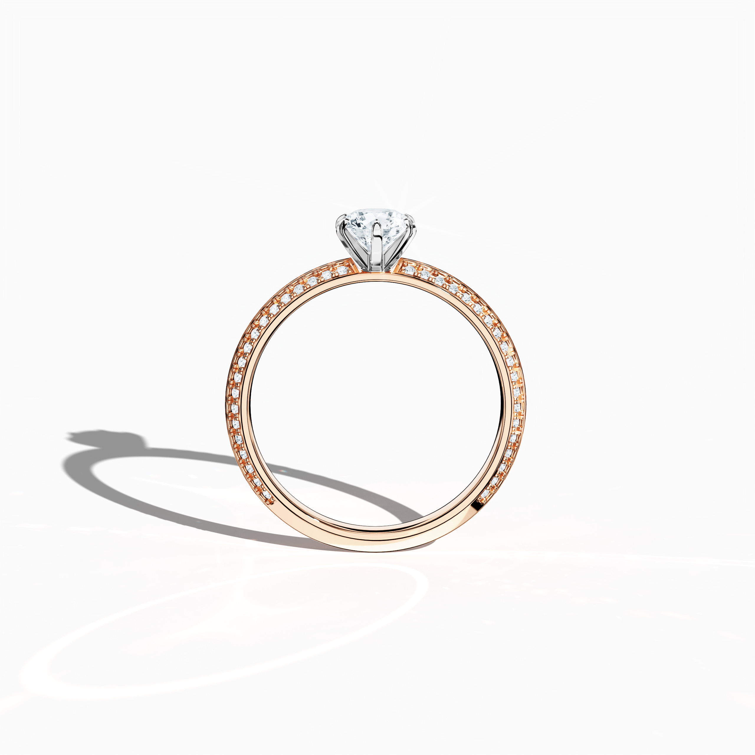 Classic solitaire diamond ring with 0.90 ct total carats – 0.50 ct center diamond and 0.40 ct pavé side stones – set in soft rose gold (blush/pink gold) with a distinctive two‑step band featuring a crisp central line. Displayed in a front view, this fine jewelry/fine jewellery ring offers timeless charm and contemporary sophistication.