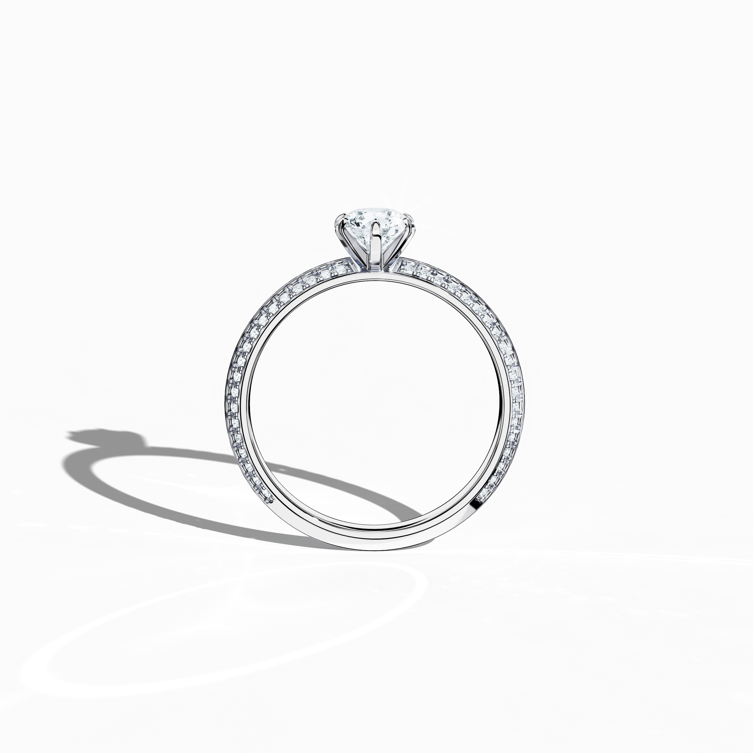 Classic solitaire diamond ring with 0.90 ct total carats – including a 0.50 ct center stone and 0.40 ct pavé side stones – set in a bright white gold band with a sharp, two‑step design and a central accent. Displayed in a front view, this fine jewelry/fine jewellery piece exudes timeless minimalism and luminous style.