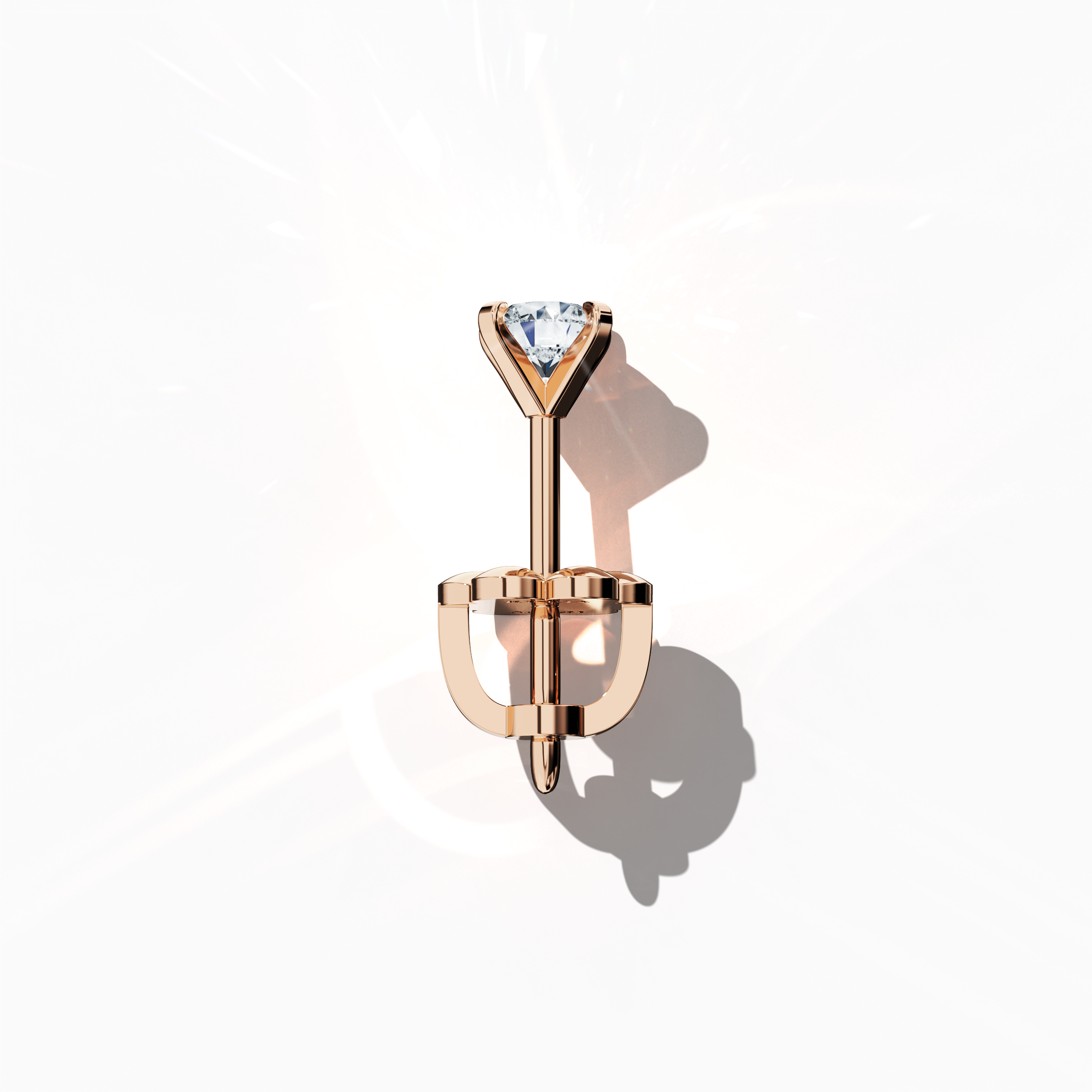 Top view of 0.60 carat natural diamond earring in 18k rose gold with nail prong setting; diamond stud, 0.60ct solitaire diamond, luxury fine jewelry/fine jewellery ear accessory.