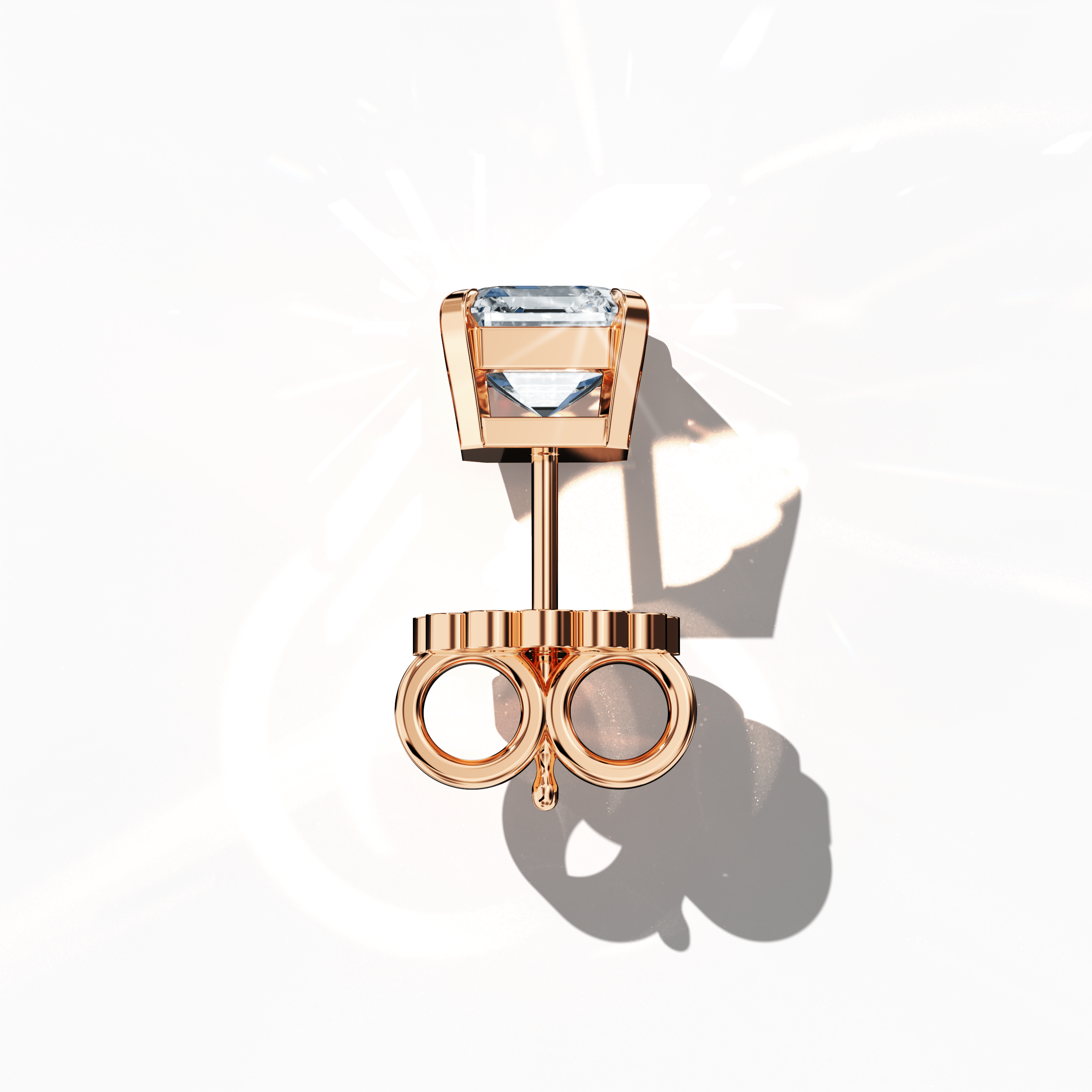 Top view of 1-carat natural diamond earring in 18k rose gold with nail prong setting; features an Asscher cut diamond (also referred to as square emerald cut or step cut diamond in certain markets) – luxury fine jewelry/fine jewellery ear accessory.
