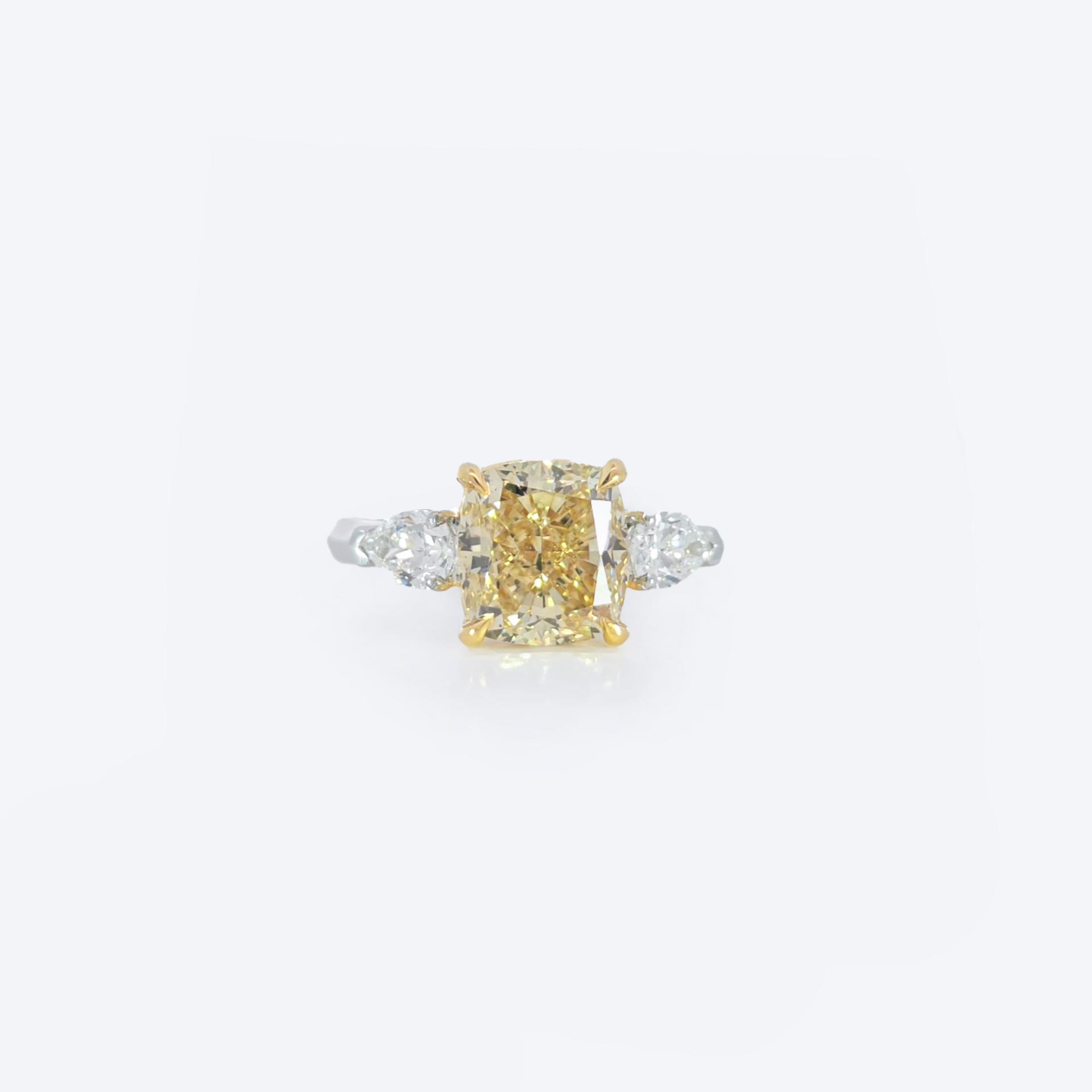 Yellow Cushion pear trio ring