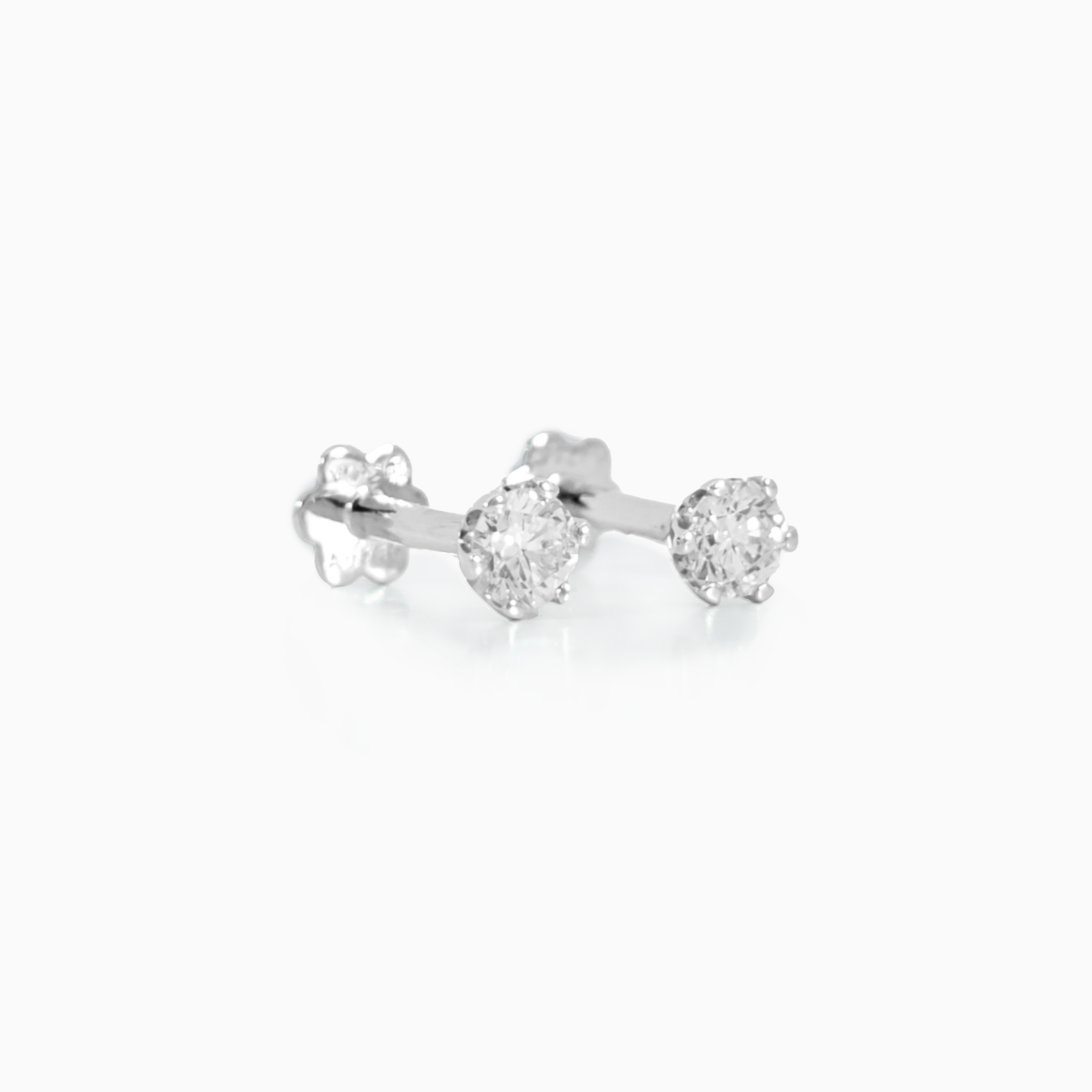 Classic Studs earrings showing 0.34 carat D-F color VS clarity diamonds in polished 18K white gold