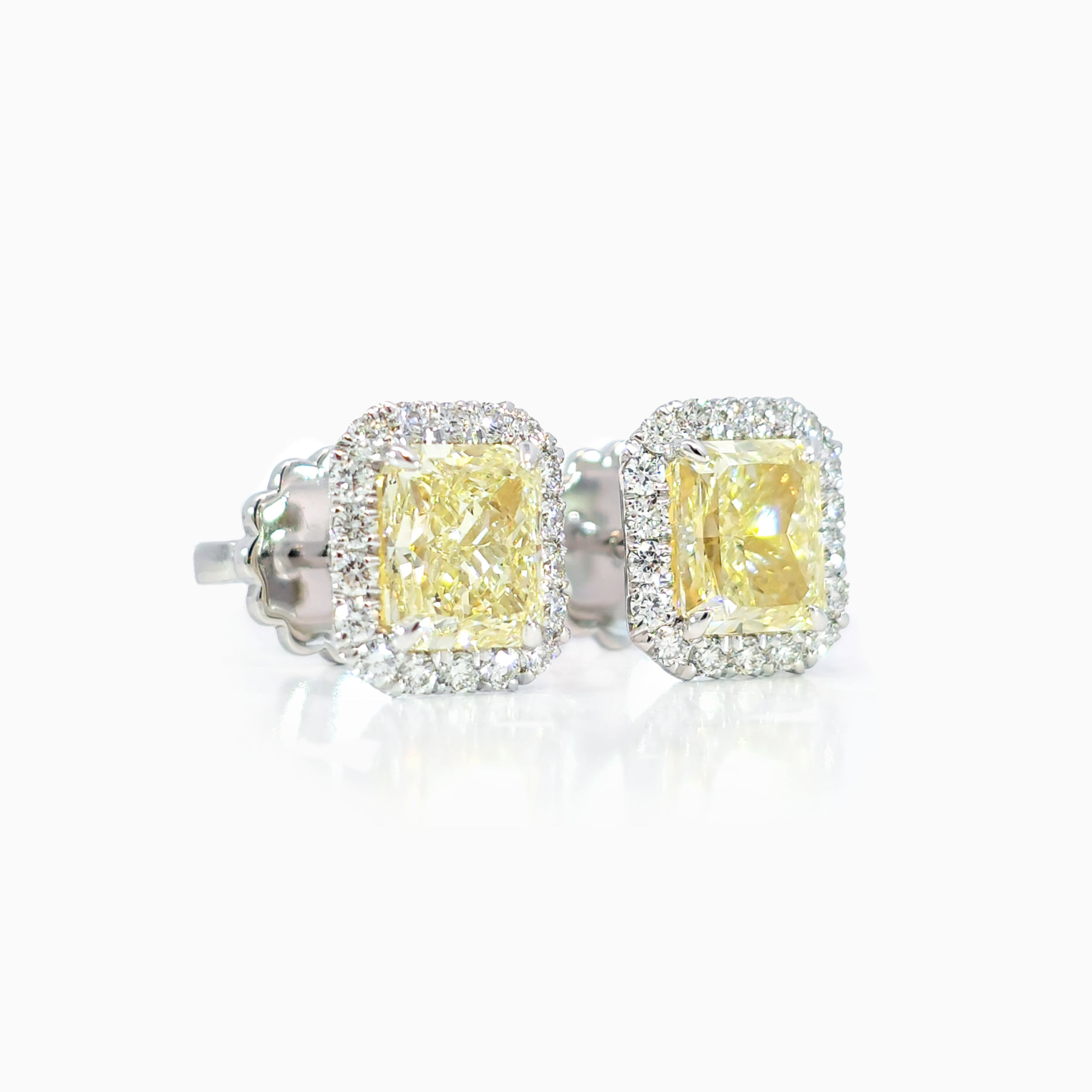Yellow Radiant Diamond Halo Earring side view showing 0.43 carat side diamonds D-F color 18K white gold setting
