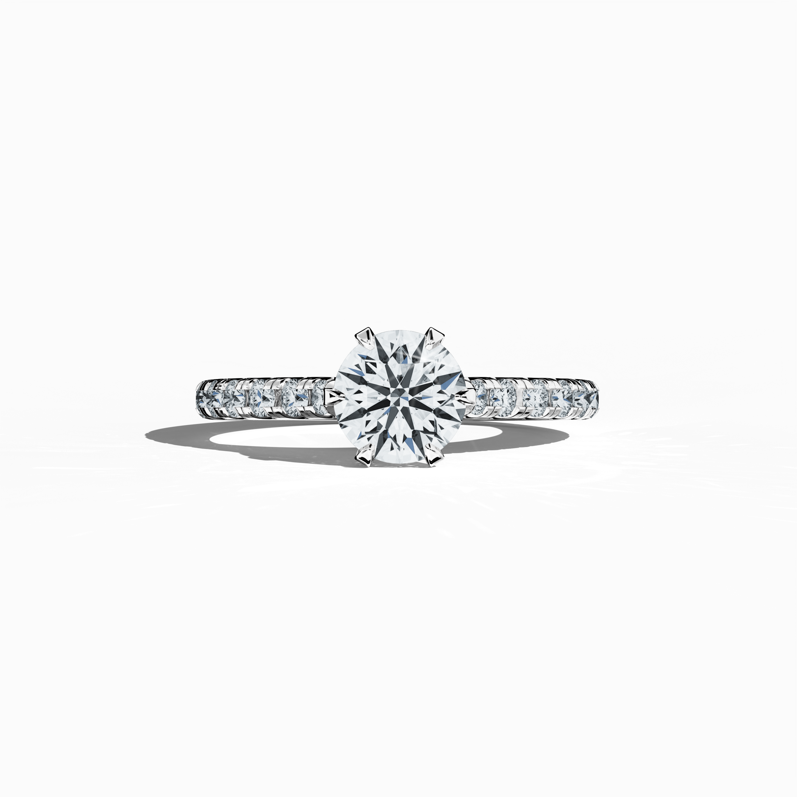 White gold solitaire paved ring with a total of 1.21 ct diamond weight, featuring a radiant 1 ct center/centre diamond and 0.21 ct side diamonds, set in a slender diamond slim band with a secure four nail prong setting. This sleeping front view captures the ring’s soft blush tone and refined design, making it an ideal choice as an engagement ring, bridal jewelry/jewellery, or fine jewelry/fine jewellery accessory. Keywords: rose gold, paved ring, diamond slim band, luxury, 1.21 ct, refined design.