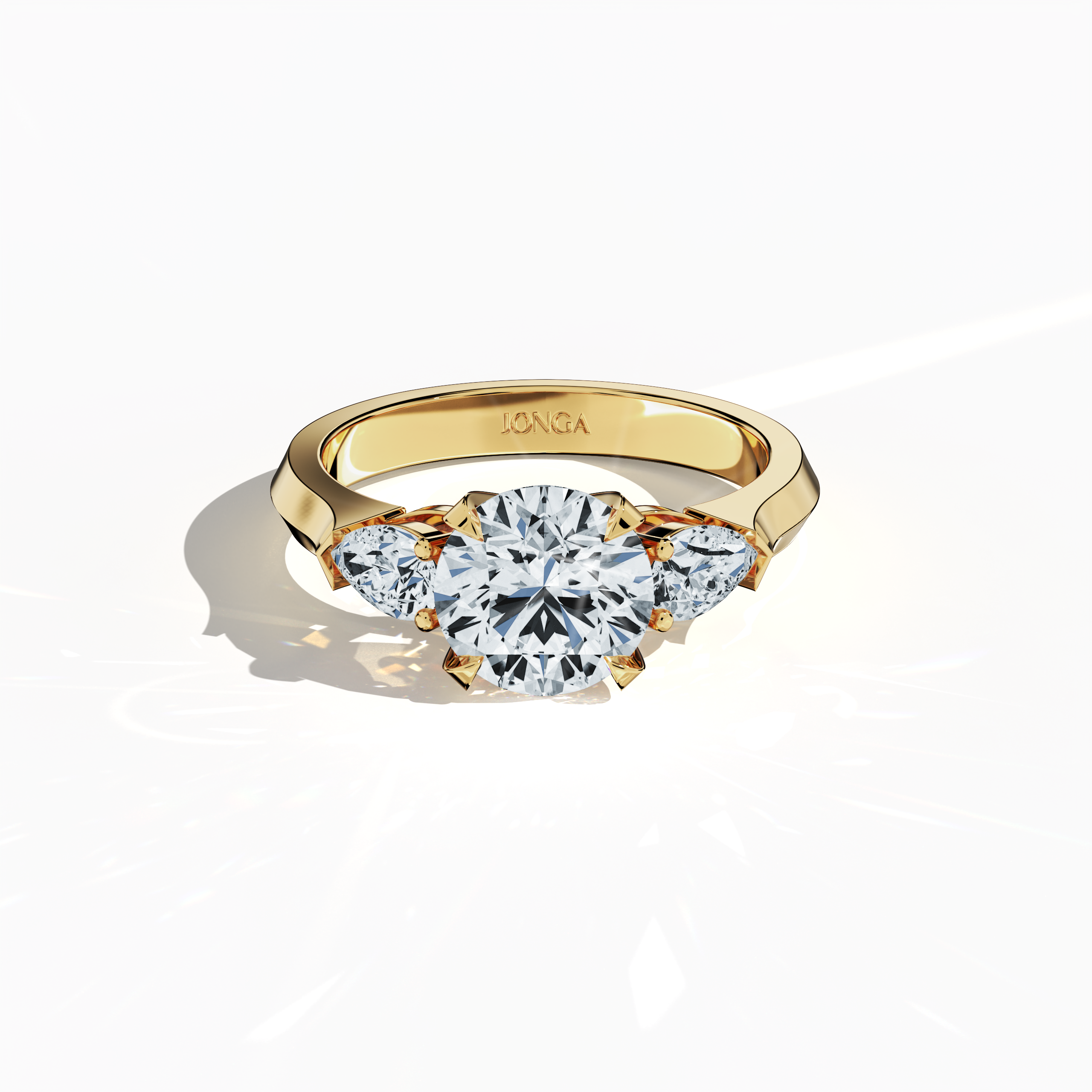 "Sleeping front top view of a yellow gold trilogy diamond ring showcasing 2.55 ct natural diamonds—a striking 2 ct round center/centre diamond with two pear‐shaped side diamonds (0.55 ct total) set in an elegant band with a four‐nail prong setting. The image emphasizes meticulous craftsmanship and a warm glow, ideal as an engagement ring, wedding band, or fine jewelry/fine jewellery piece. Also known as a trilogy ring, three‐stone ring, three‐diamond ring, trinity ring, and triptych ring design.