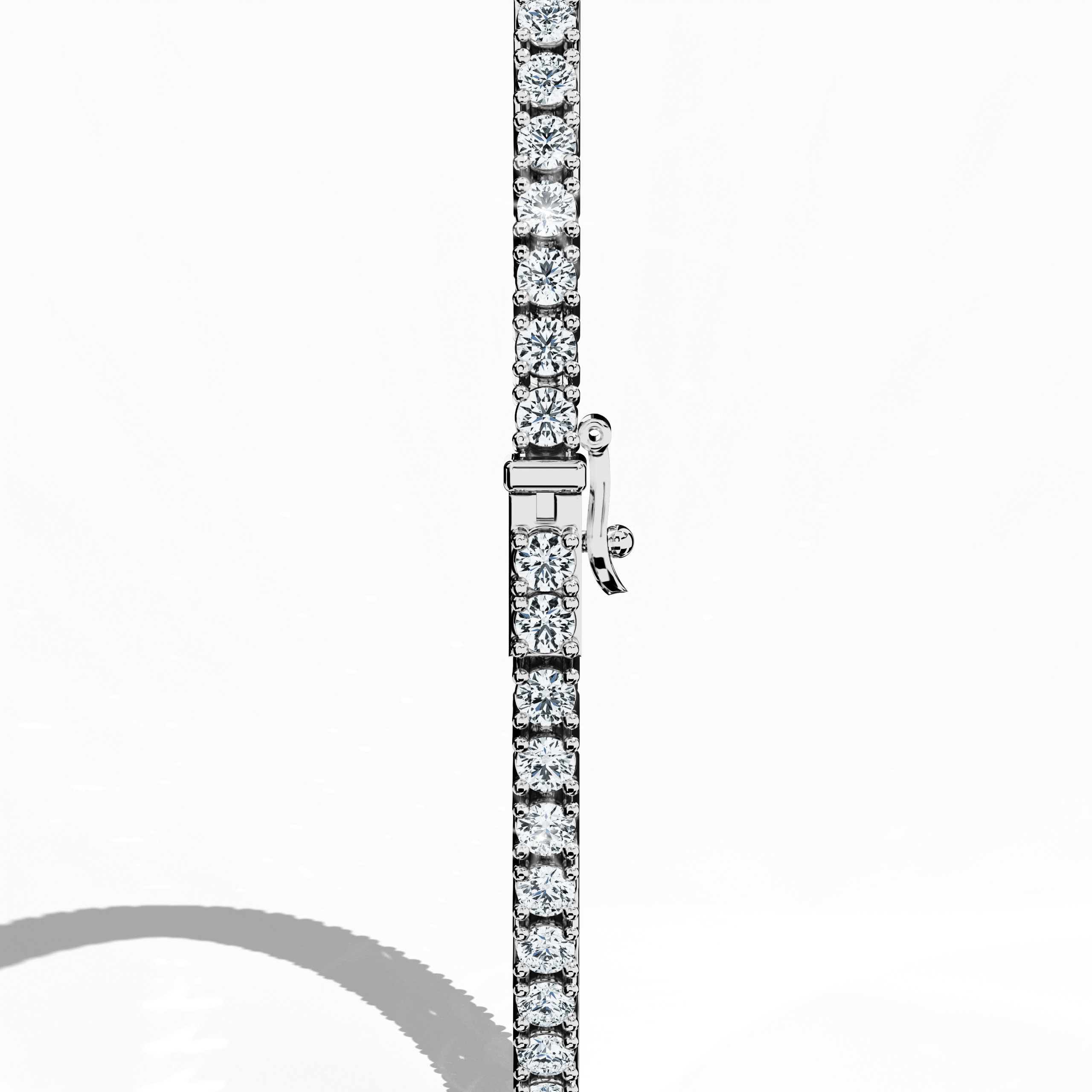 In a standing back side view, this 3 carat diamond tennis bracelet in white gold (also referred to as grey gold or palladium gold) highlights its secure clasp and continuous row of round brilliant stones. Known as tennis bracelet, line bracelet, eternity bracelet, river bracelet, or inline bracelet, the four-prong design underscores each gem’s radiance. Perfect for refined statements. Keywords: diamond tennis bracelet, 3 carat, white gold, jewelry, prong setting.
