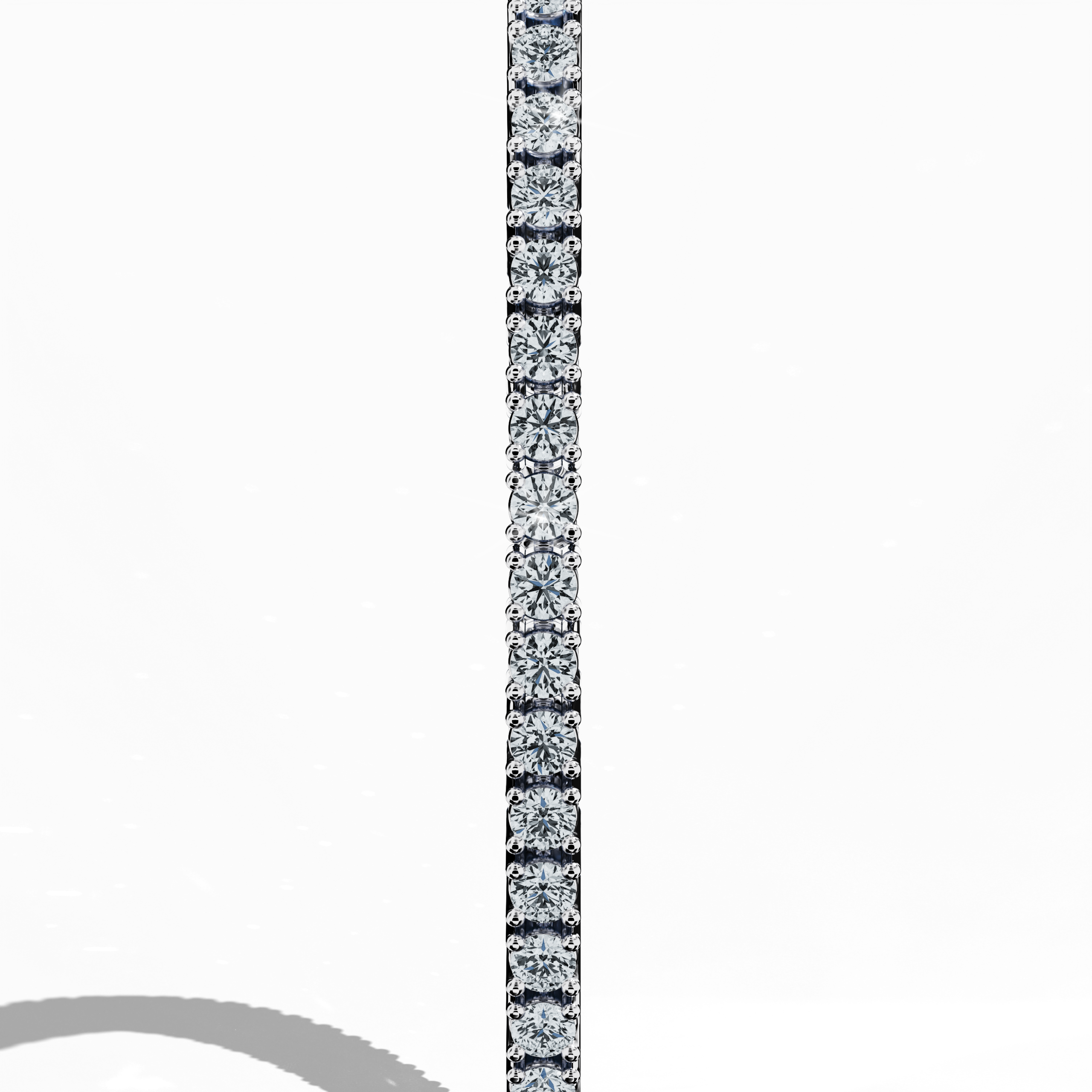 In a standing side view, this 3 carat diamond tennis bracelet in white gold (also referred to as grey gold or palladium gold) reveals a sleek profile with prong-set round brilliant stones. Known as tennis bracelet, line bracelet, eternity bracelet, river bracelet, or inline bracelet, its four-prong design ensures enduring sparkle. Ideal for formal events or daily wear. Keywords: diamond tennis bracelet, 3 carat, white gold, jewelry, prong setting.