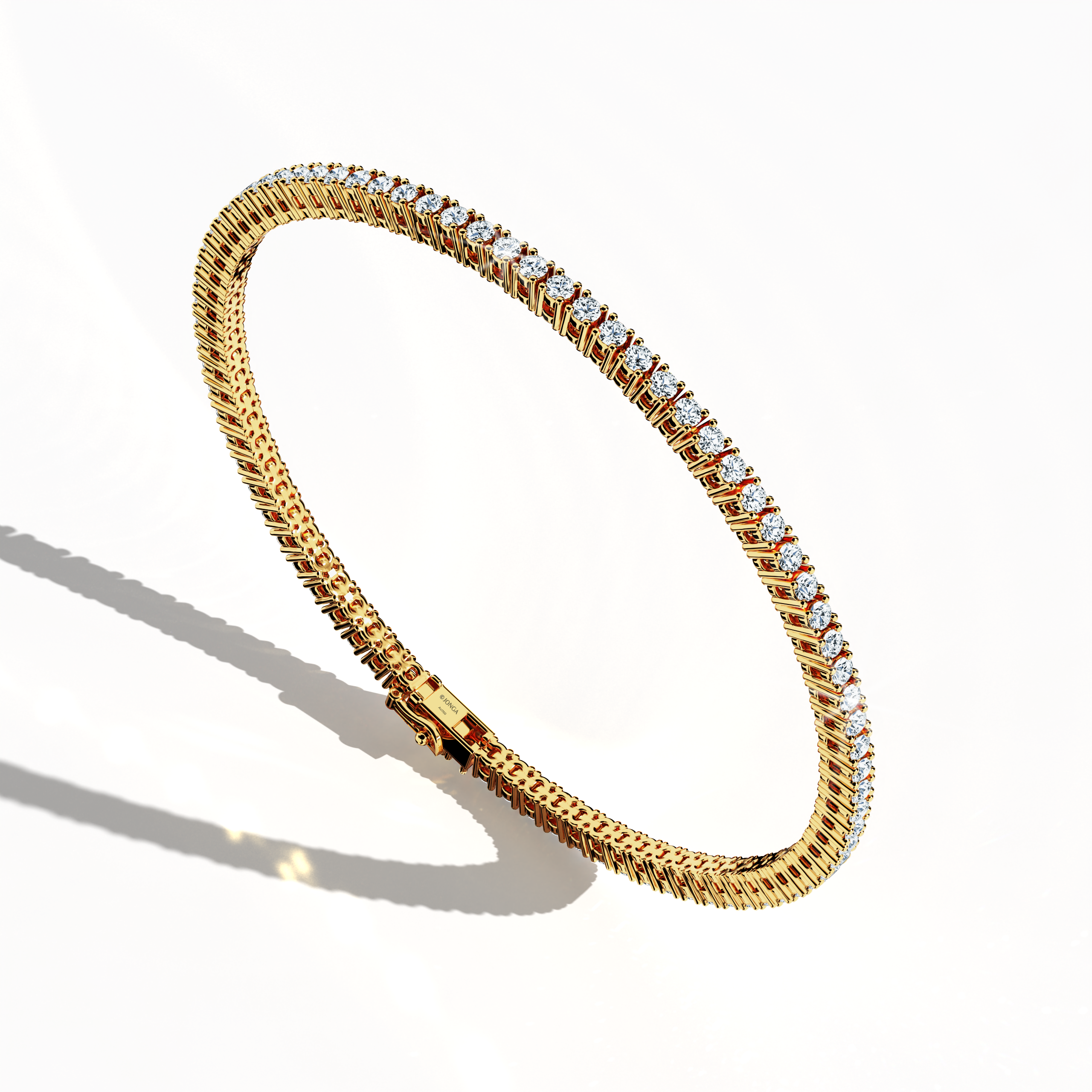 In a standing front top side view, this 3 carat diamond tennis bracelet in yellow gold (also referred to as classic gold or champagne gold) showcases prong-set round brilliant stones with a graceful curvature. Known as tennis bracelet, line bracelet, eternity bracelet, river bracelet, or inline bracelet, the four-prong setting accentuates each diamond’s fire. A versatile choice for elegant style. Keywords: diamond tennis bracelet, 3 carat, yellow gold, jewelry, prong setting.