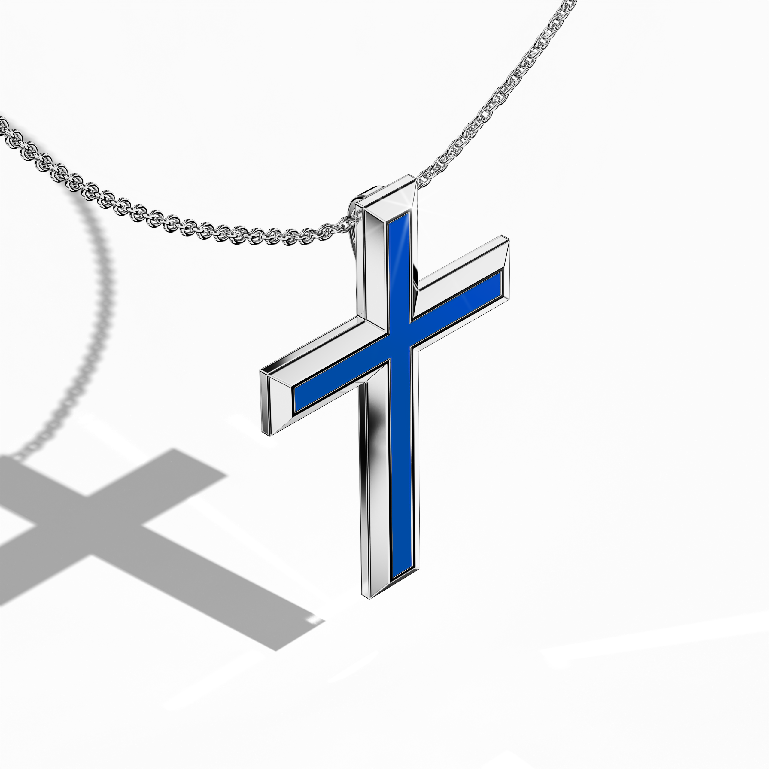 Front top side view of a center enamel 3‑step cross pendant in radiant white gold, alternatively known as pale or silver‑toned gold. The dynamic blue enamel centerpiece, also called cobalt or azure enamel, emphasizes the layered, tri‑tier design that unites sacred symbolism with contemporary style. Detailed contours and refined polish are visible from this angled perspective, underscoring its status as a cherished, versatile piece of jewelry.
Keywords: three‑step cross, white gold, blue enamel.