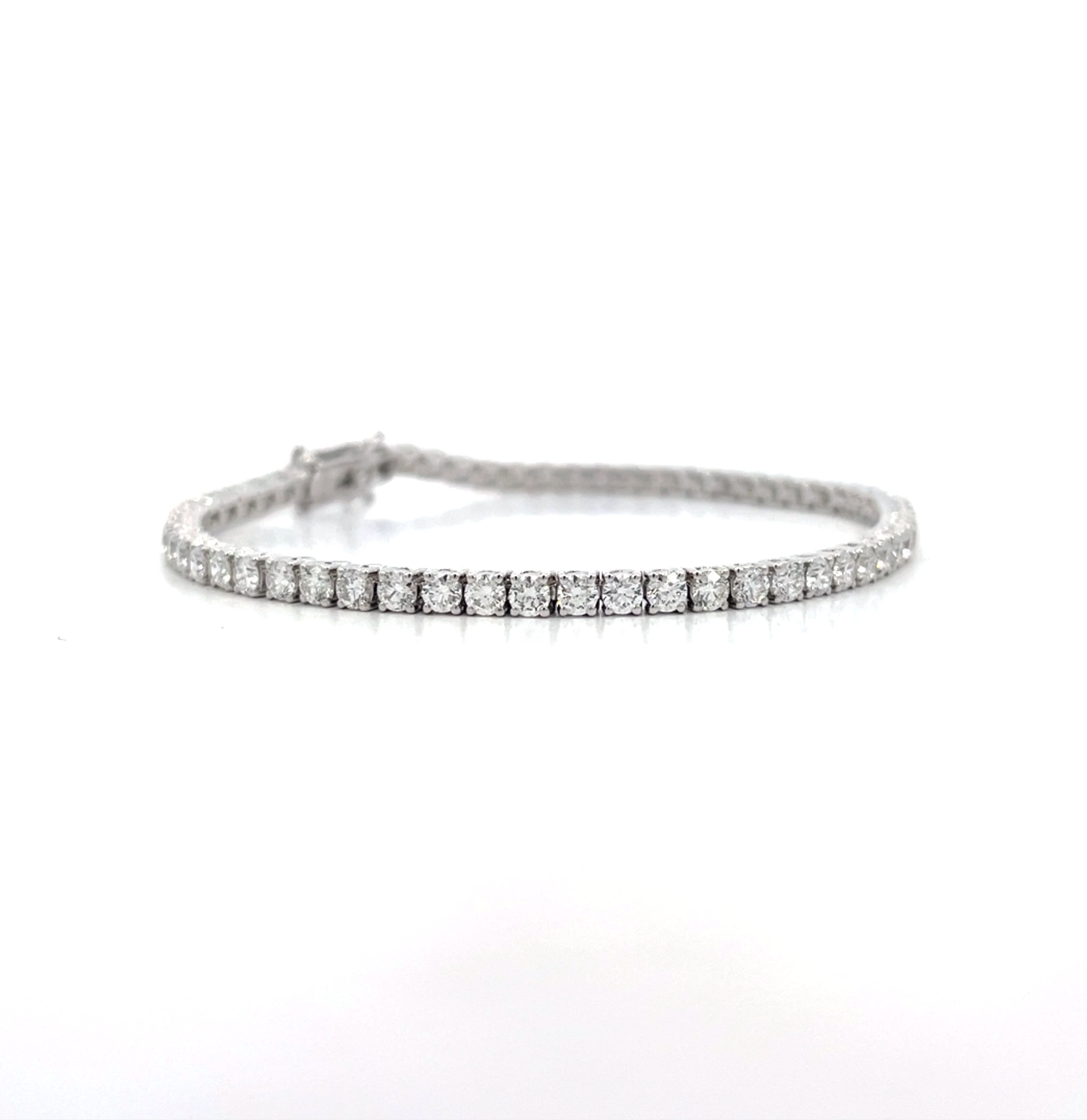 Tennis Bracelet showing 4.40 carat D-F color VS clarity diamonds in luxury 18K white gold setting
