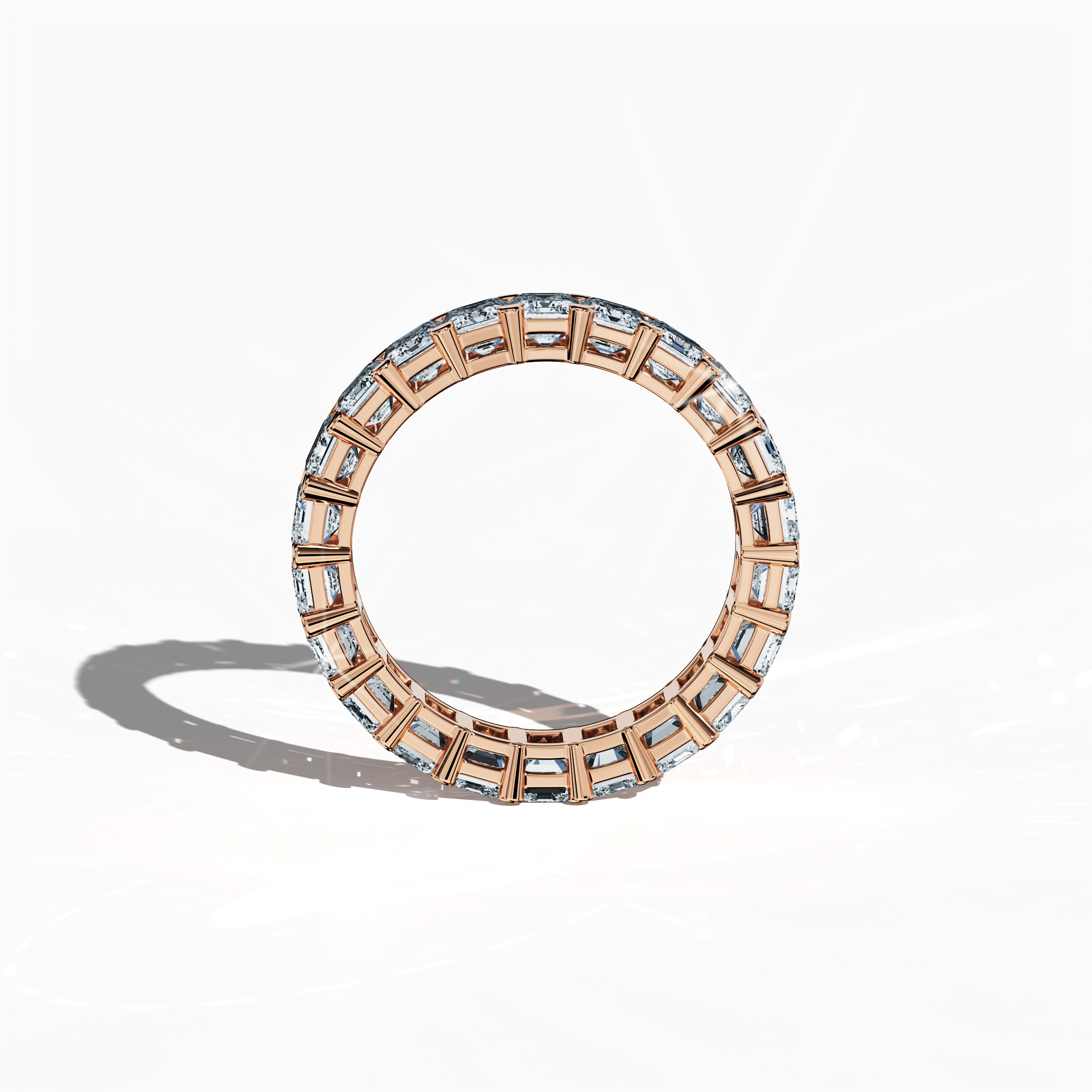 Emerald Eternity Ring in Rose Gold