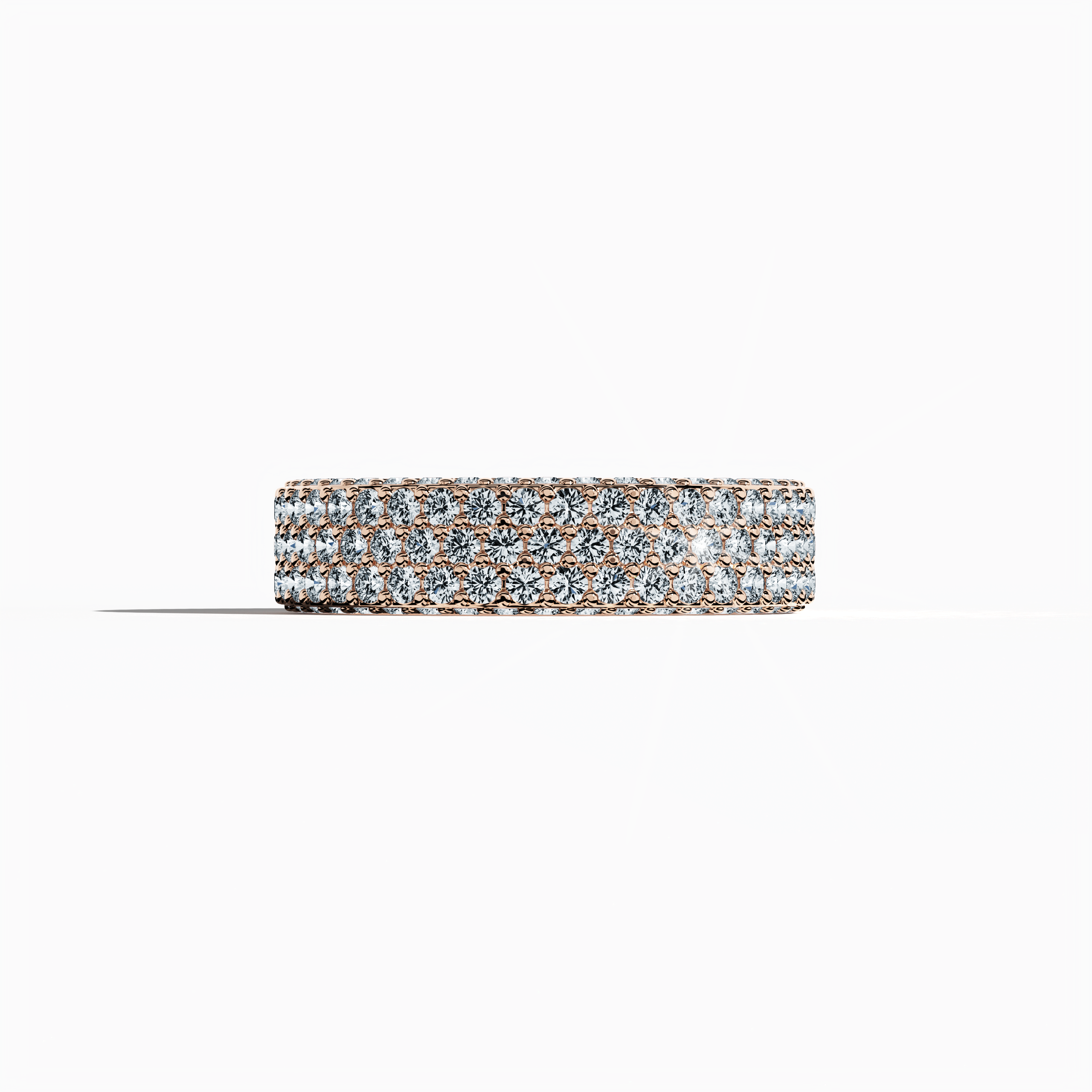 Discover the romantic allure of our rose gold 5‑row diamond band, showcased in a serene sleeping front view. Adorned with up to 2.55 carats of micro diamonds, the band exudes a warm blush radiance and intricate detailing. Reflecting the elegance of 4‑row designs—Classic, Vintage, Contemporary, Modern, Minimalist, Ornate, Channel‑Set—its soft rose‑tinted finish and refined craftsmanship evoke a luxurious, globally inspired charm. Keywords: rose gold, micro diamond, luxury, romantic, elegant.