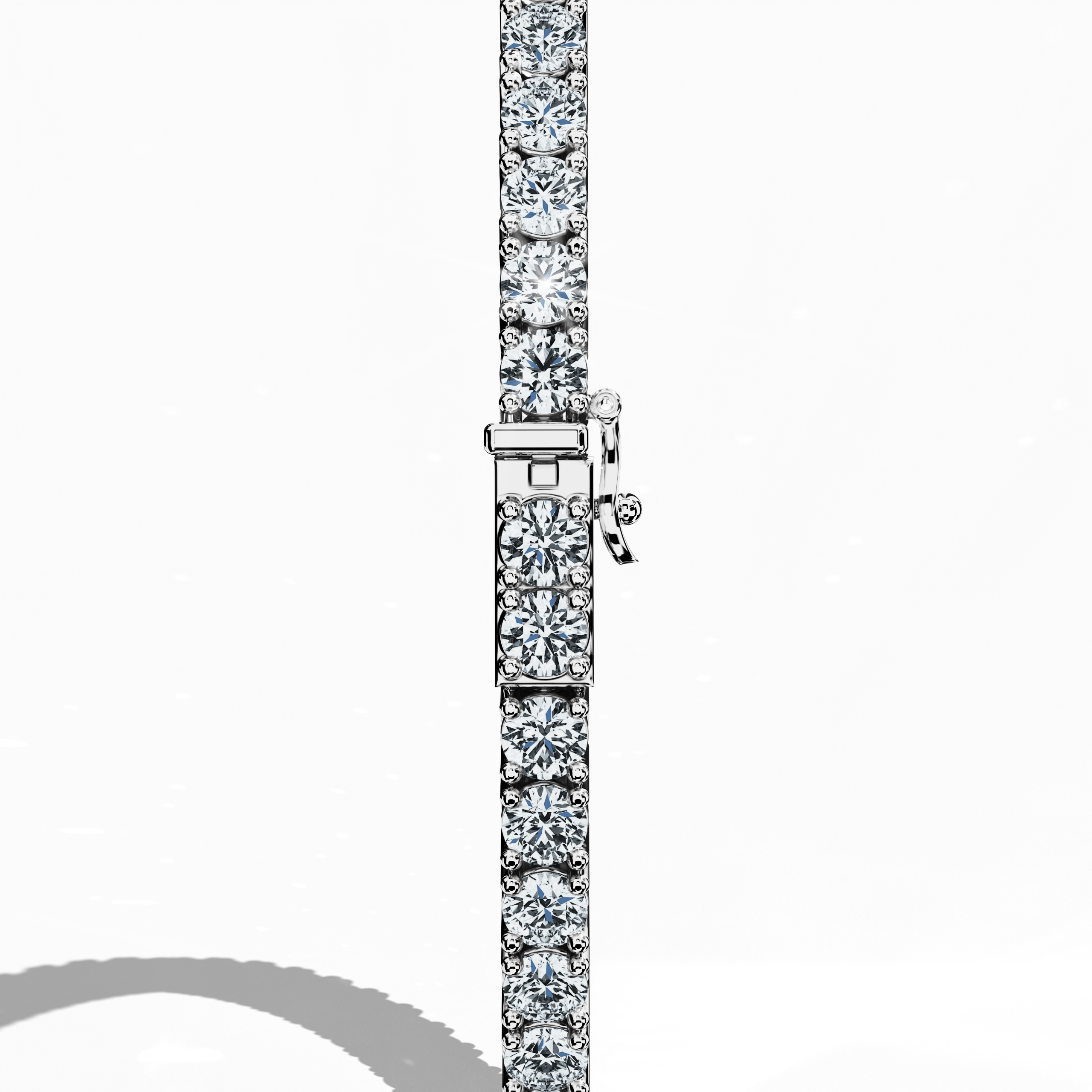 This 6-carat diamond tennis bracelet in white gold (sometimes known as grey gold or palladium gold) is shown from a standing back angle, highlighting the clasp mechanism and secure prong setting. Also called a line bracelet, eternity bracelet, river bracelet, or inline bracelet, it features luminous round diamonds in a continuous row. Its refined craftsmanship suits both modern and classic styles. Keywords: diamond tennis bracelet, white gold, line bracelet.