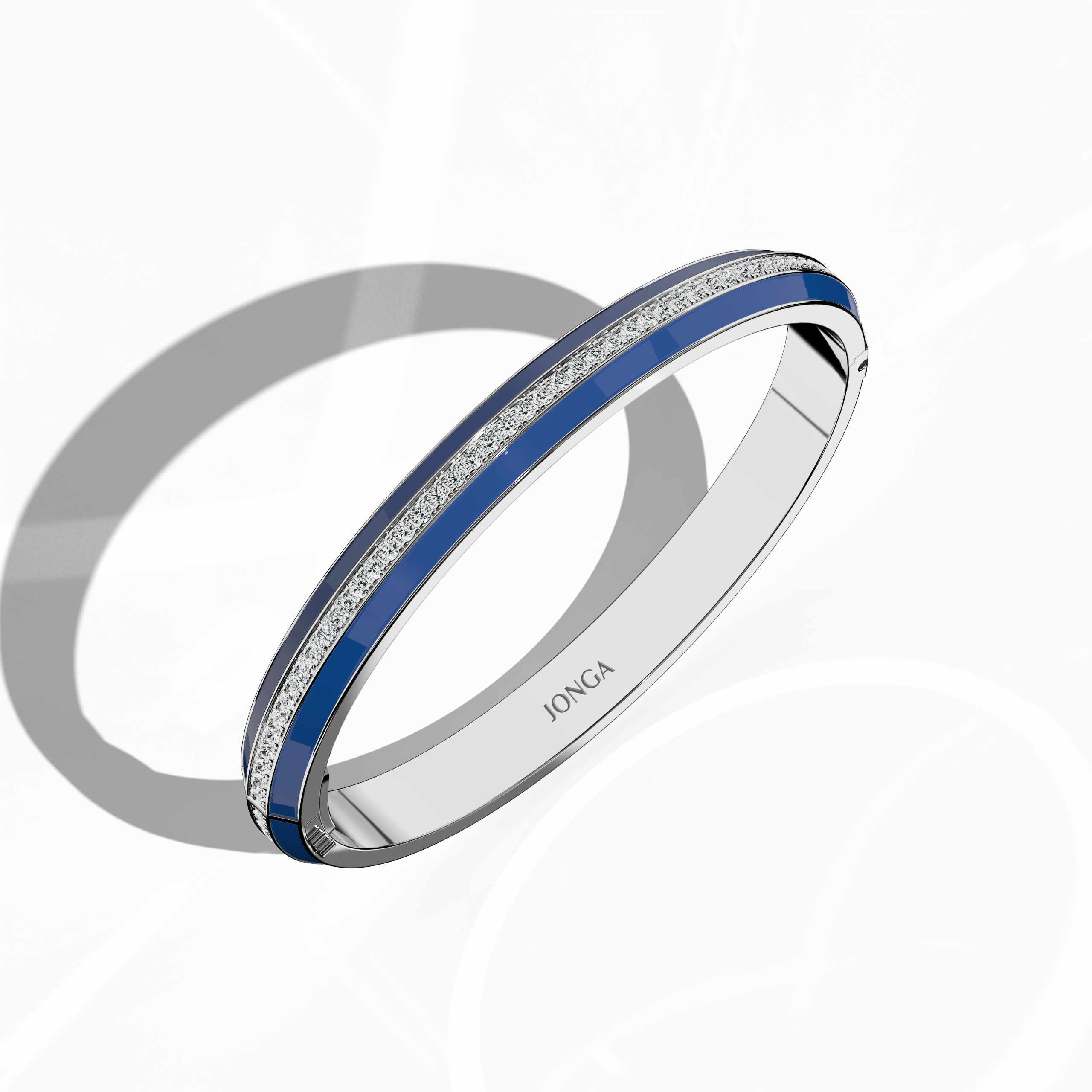 Standing front top side view of a side enamel center paved bangle in white gold (often referred to as blanc gold), adorned with a deep blue enamel band. Enriched by 2.60 carats of sparkling diamonds in a pavé design, this versatile ornament—bracelet, armlet, kangan, or pulsera—combines sleek artistry with timeless flair. Its elevated angle highlights the intricate craftsmanship. Keywords: bangle, enamel, diamonds, white gold.