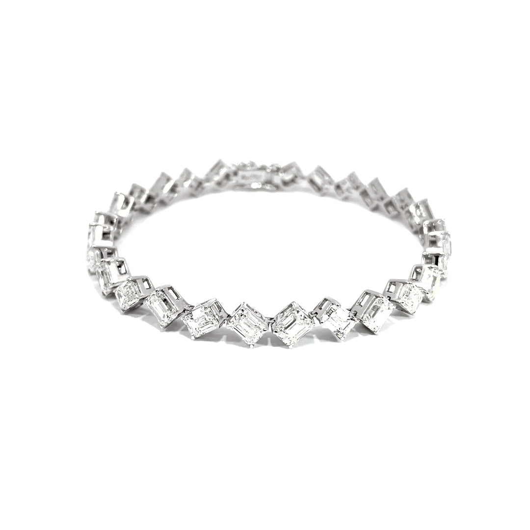 Emerald Diamond Bracelet showing 11.20 carat emerald cut diamonds 0.40 carat each GIA certified 18K white gold
