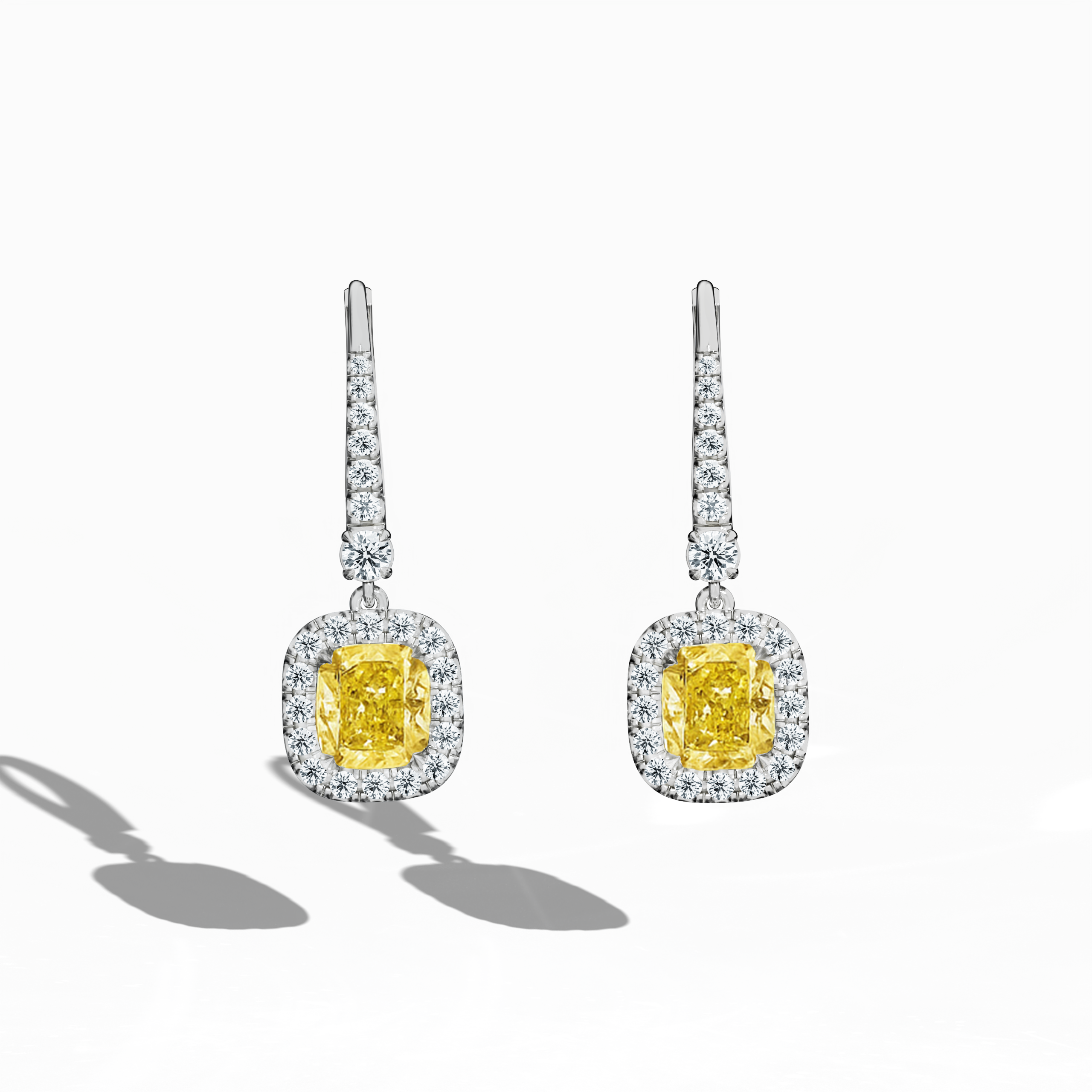 Yellow Cushion Halo Earring in white Gold