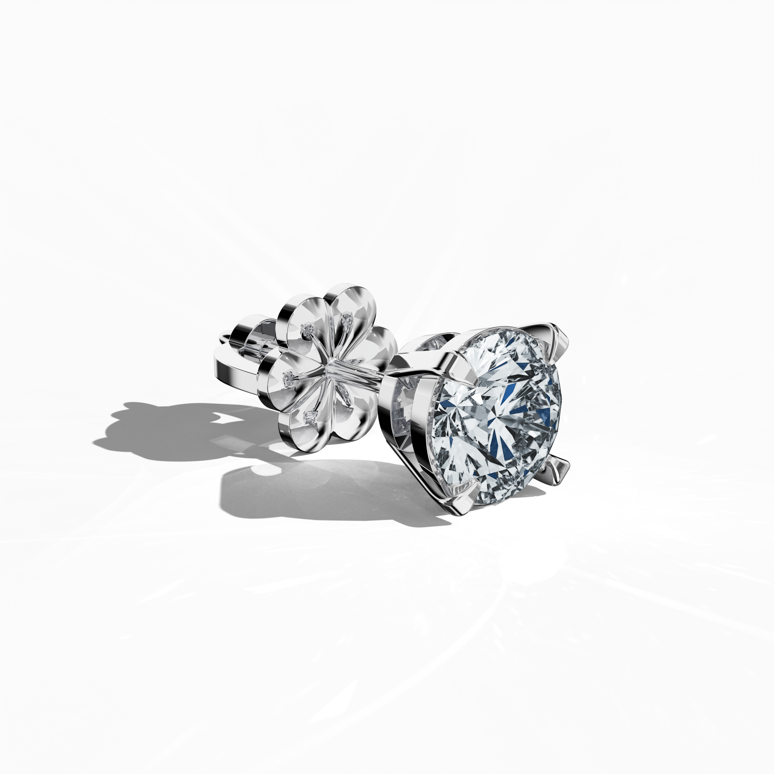 Front top side view of 2 carat natural diamond stud earrings in classic basket and Nail Prong/claw settings, crafted in 18k white gold.