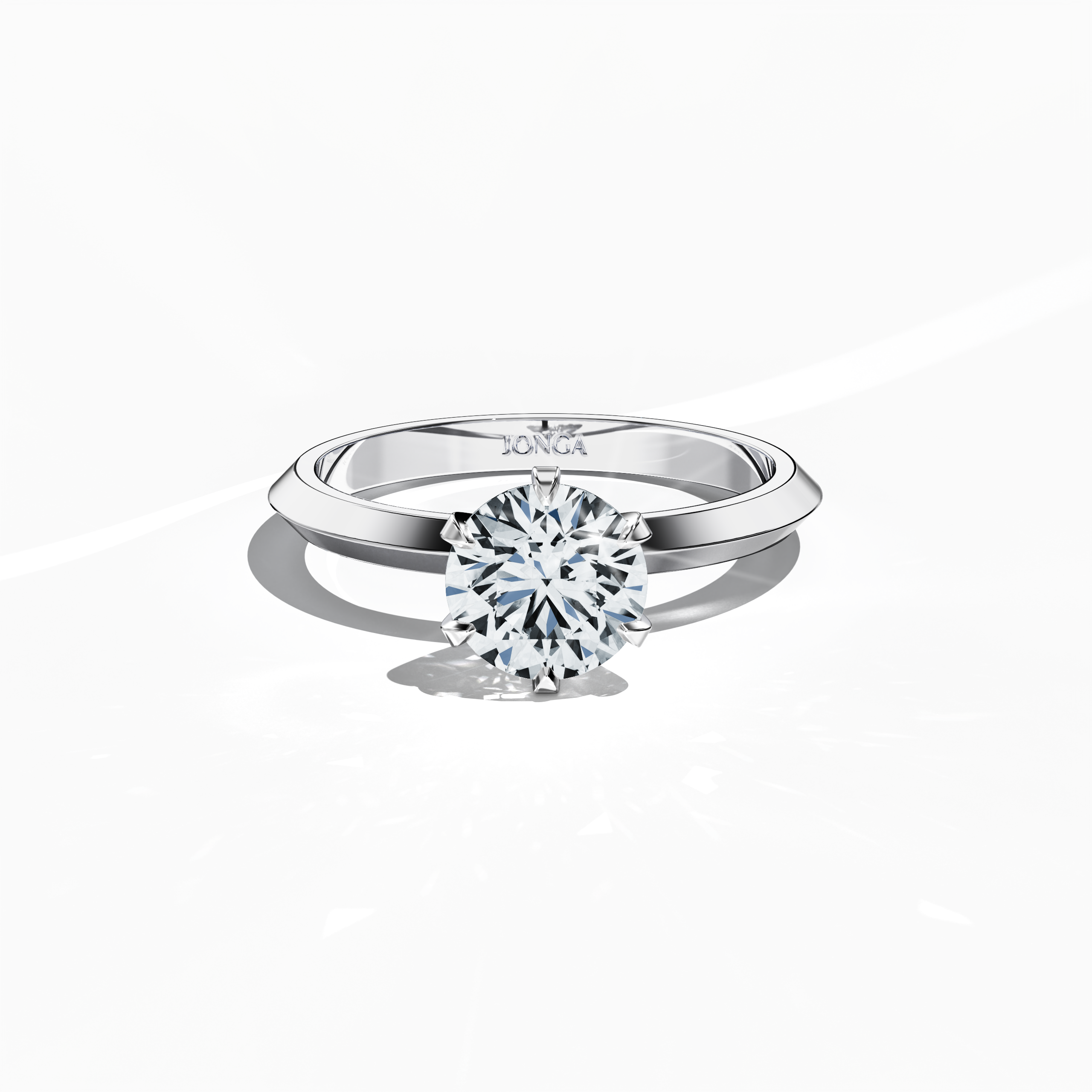 Solitaire ring featuring a 1 carat diamond secured by six delicate claw prongs in white gold with a two-tier band marked by a crisp central line, shown from a front top view to emphasize its sleek profile and sparkling center stone—a modern fine jewelry/fine jewellery accessory.