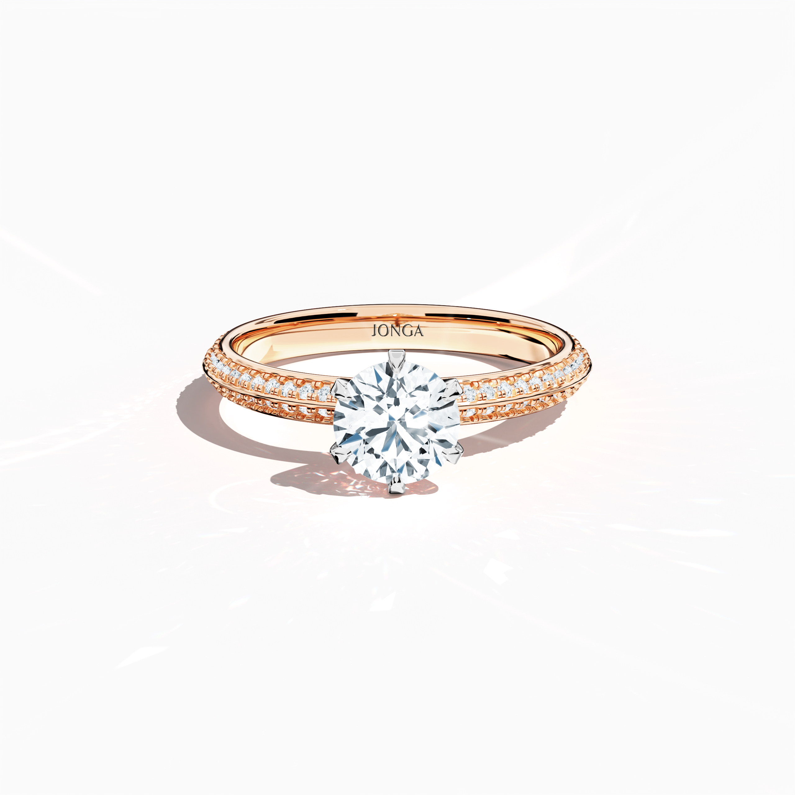 Elegant 1.40 ct diamond ring in a pavé setting, with a 1 ct center stone and 0.40 ct side stones, crafted in soft rose gold (blush/pink gold) with a dual‑tier band defined by a crisp central line. Captured from a front top view, this fine jewelry/fine jewellery ring highlights its luminous pavé detail and gentle, sophisticated finish.