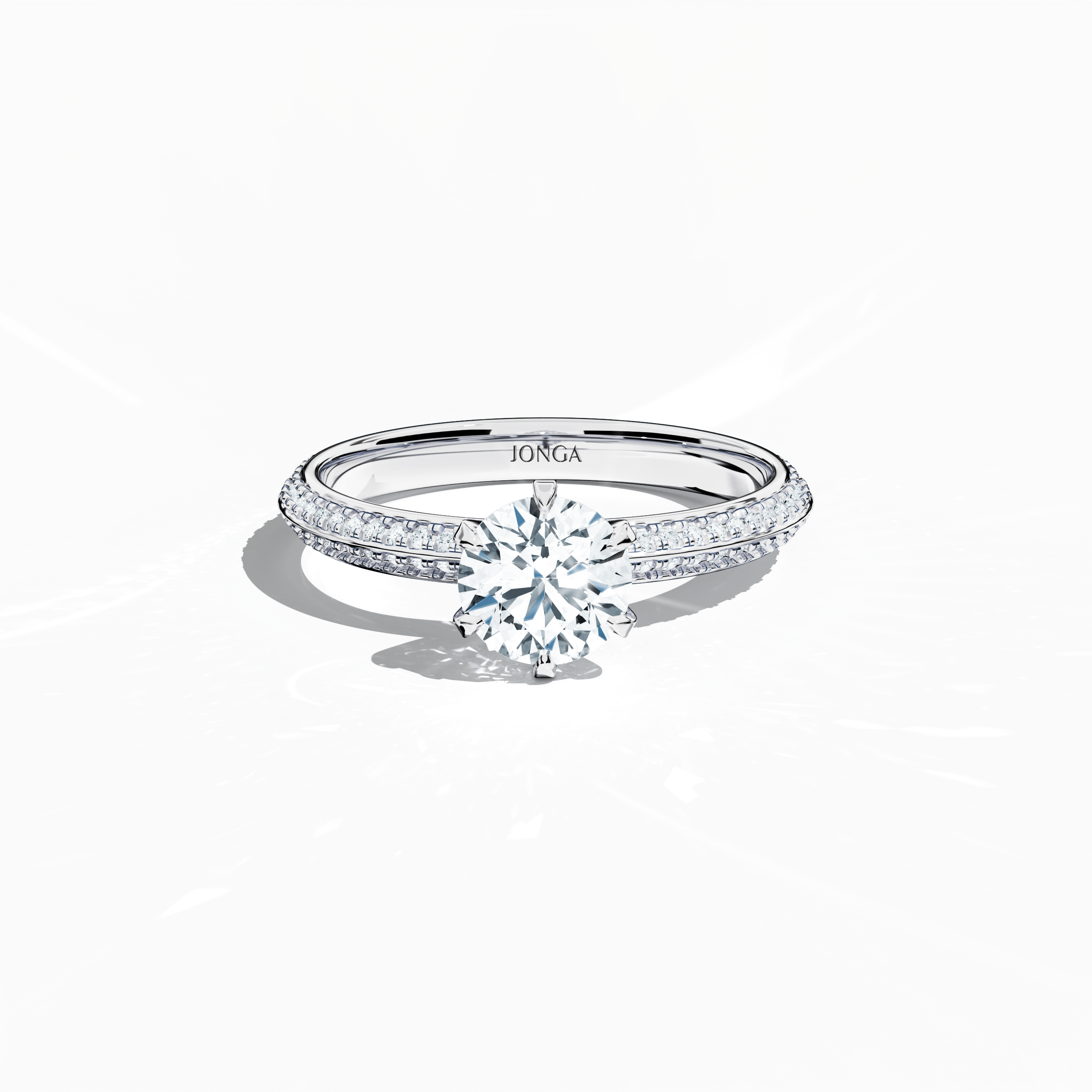 "Elegant 1.40 ct diamond ring in a pavé setting, with a 1 ct center diamond and 0.40 ct side stones, crafted in silvery white gold with a dual‑tier band defined by a crisp central line. Captured from a front top view, this fine jewelry/fine jewellery ring highlights its contemporary design and brilliant sparkle.