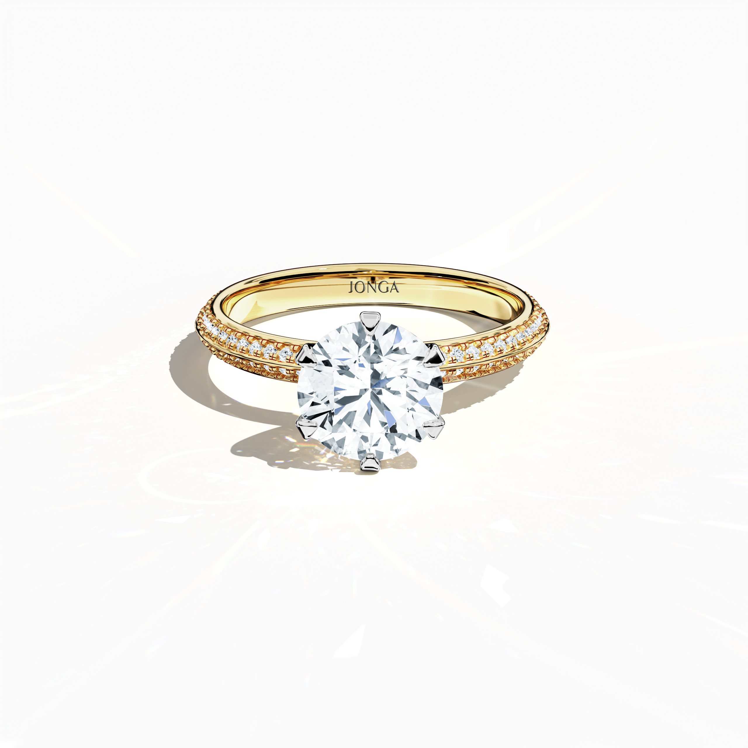 Elegant 2.40 ct diamond ring in a six‑prong setting with a pavé band—comprising a 2 ct center stone and 0.40 ct side stones—rendered in classic yellow gold with a dual‑tier, step‑accented band and a defined midline. Captured from a front top view, this fine jewelry/fine jewellery ring highlights its luxurious pavé detail and warm radiance.